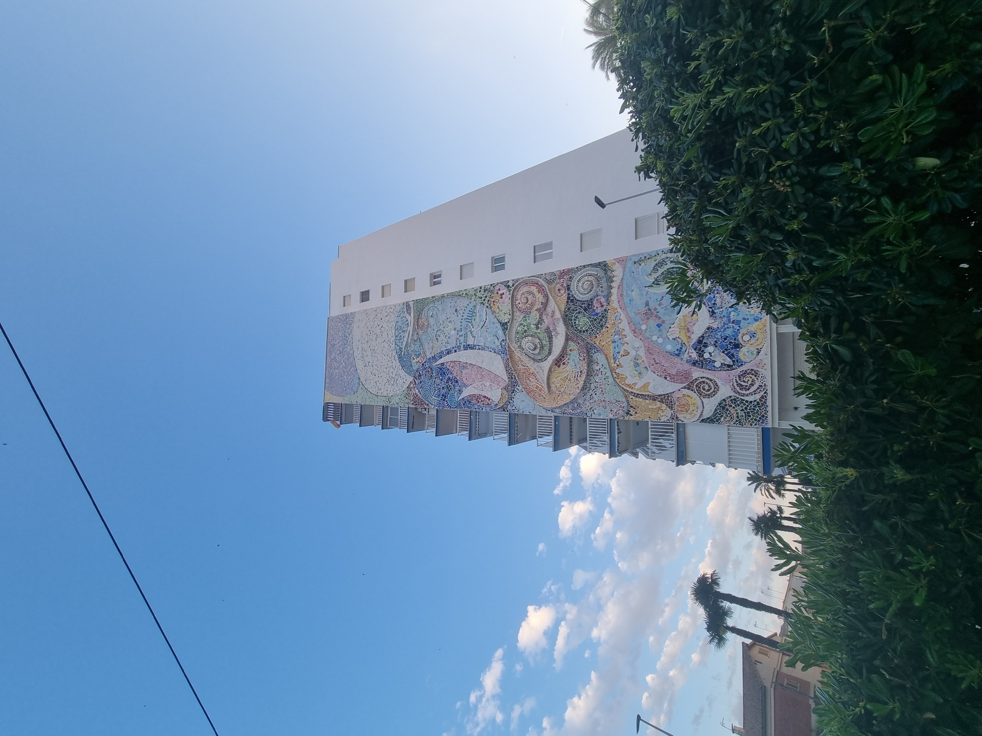 Colorful mosaic mural spotted on building in La Pobla de Farnals