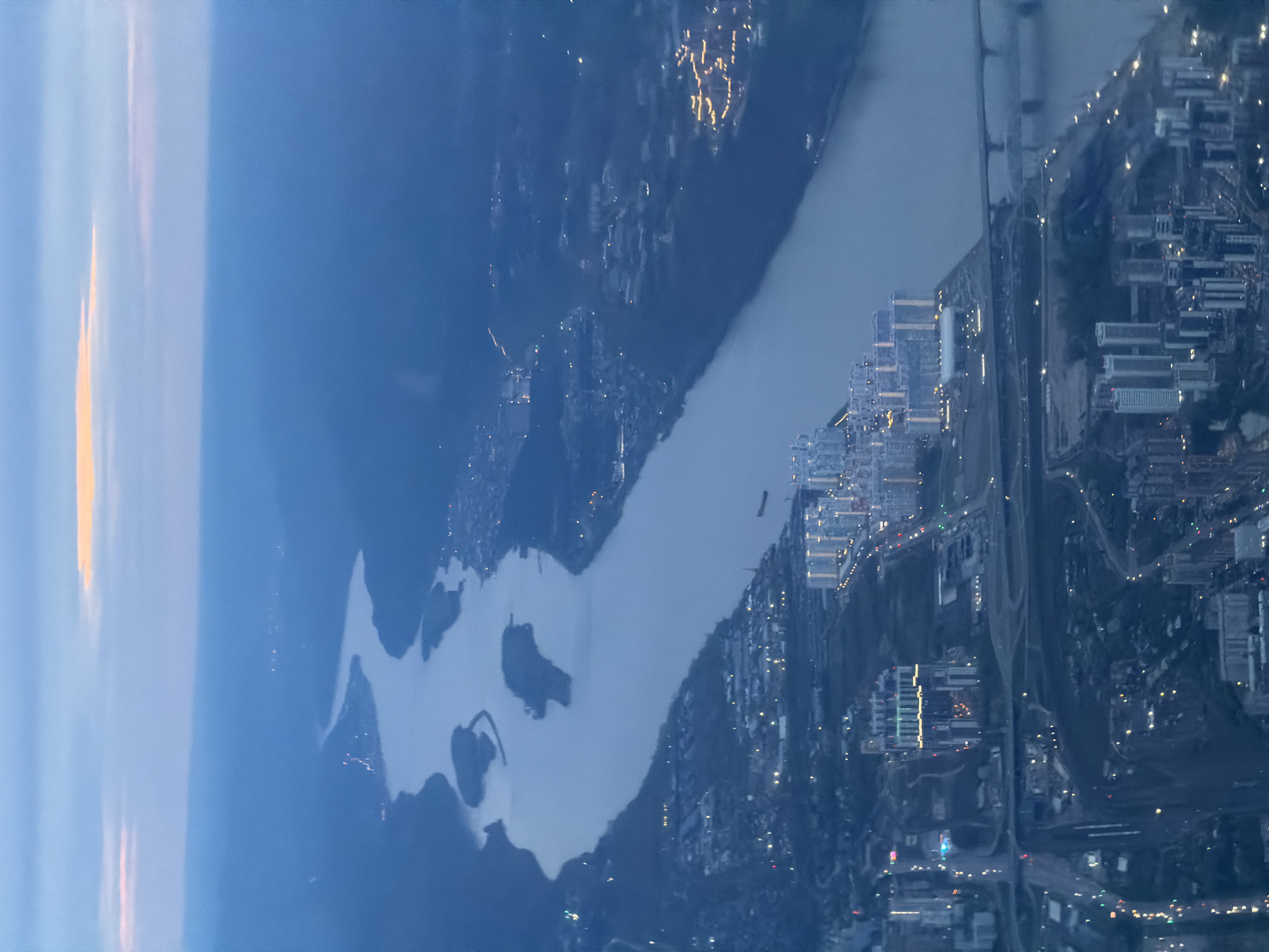 Dusk aerial view captures Mar'yasovo cityscape along Russian river