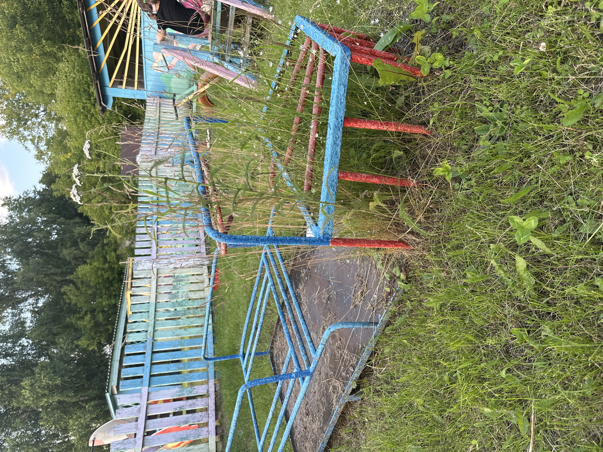 Afternoon at a modest village playground in Yaroslavka, Russia