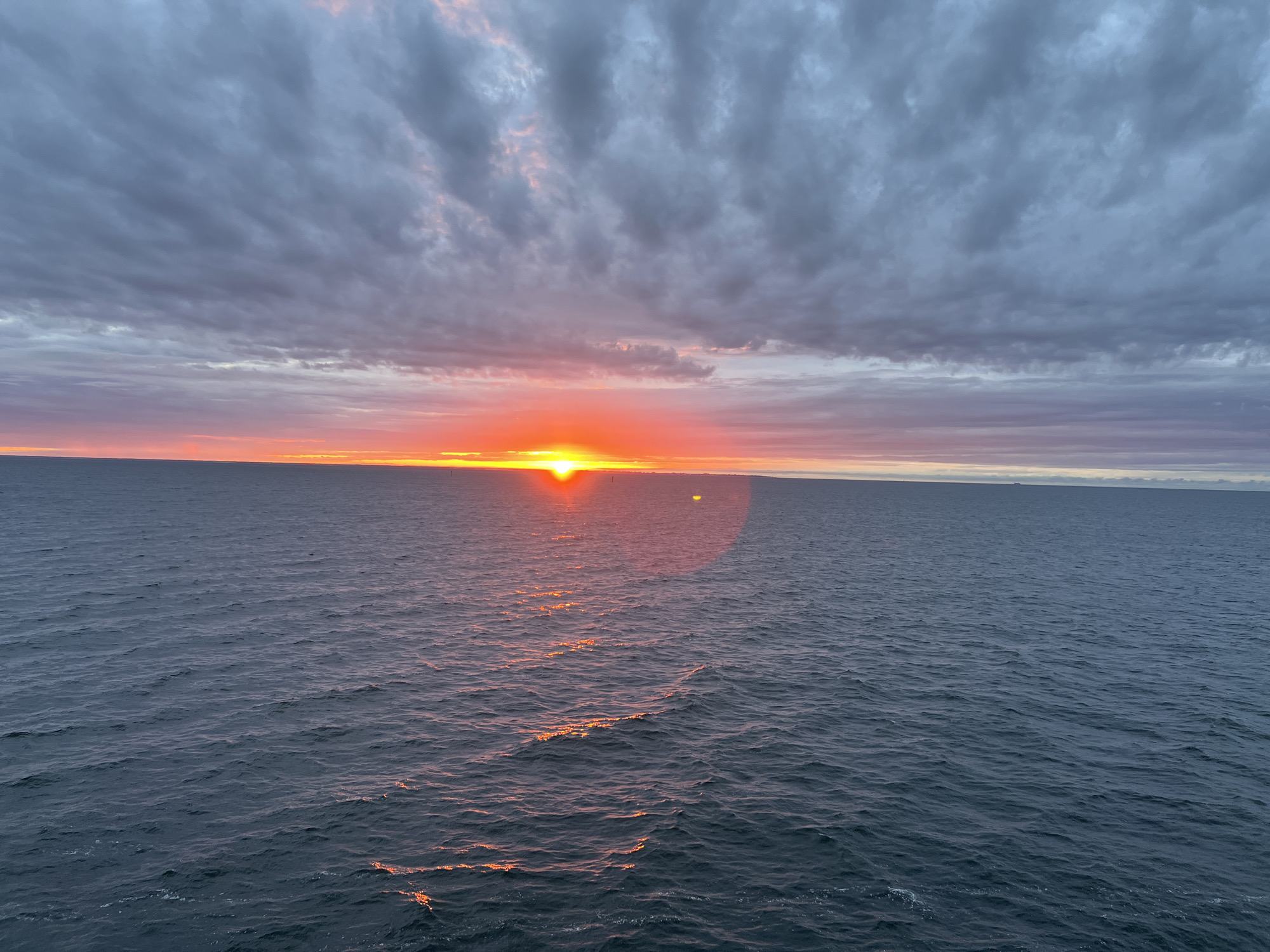 Baltic sunset over Gdynia, city skyline fading into dusk
