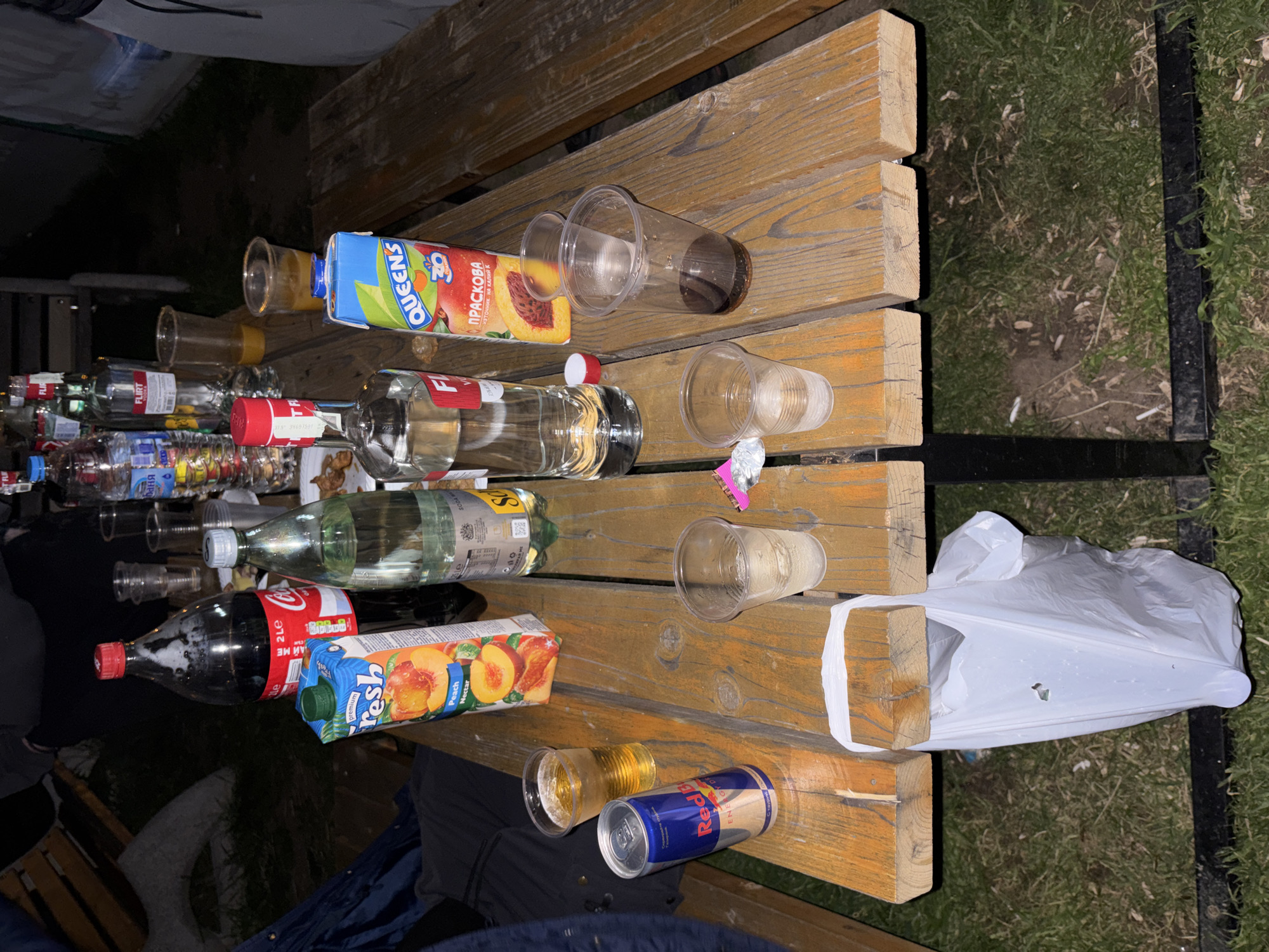 Picnic table littered with empty bottles in Negovan