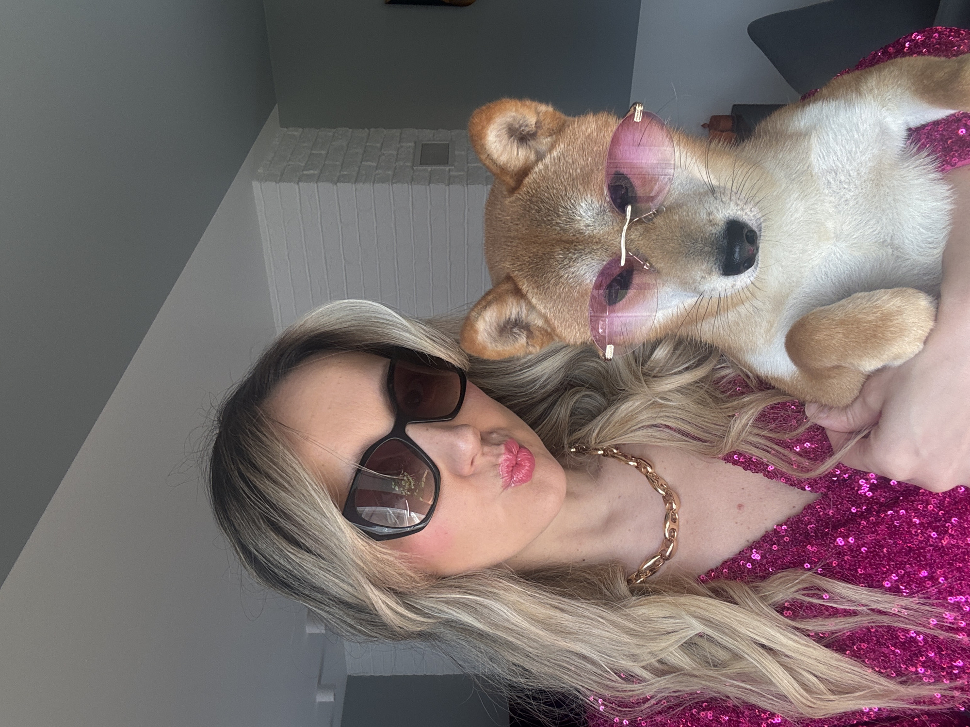 Woman and Shiba Inu stage matching sunglasses photoshoot in Latvia