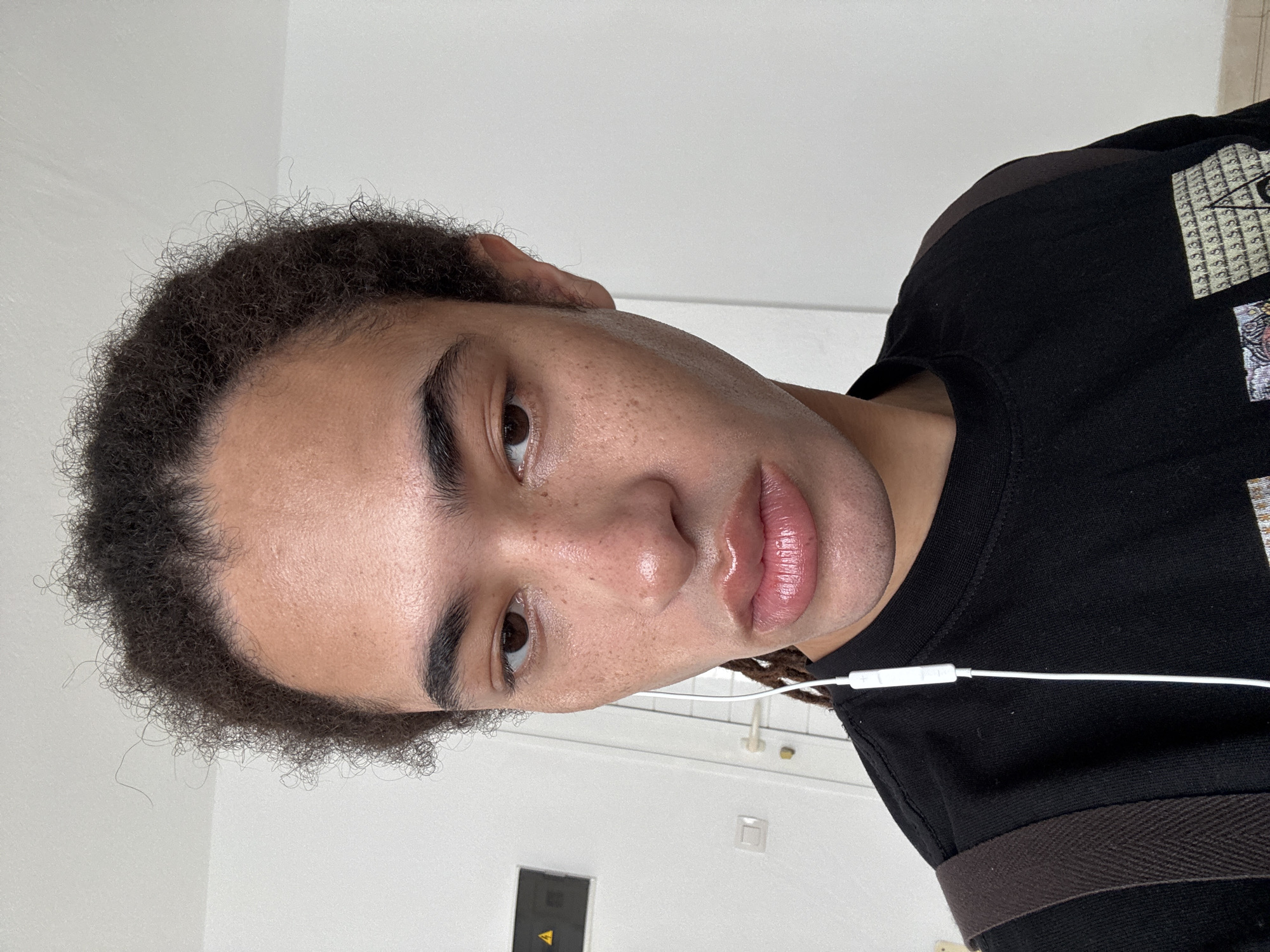 Portrait photograph captured of unidentified person in black shirt
