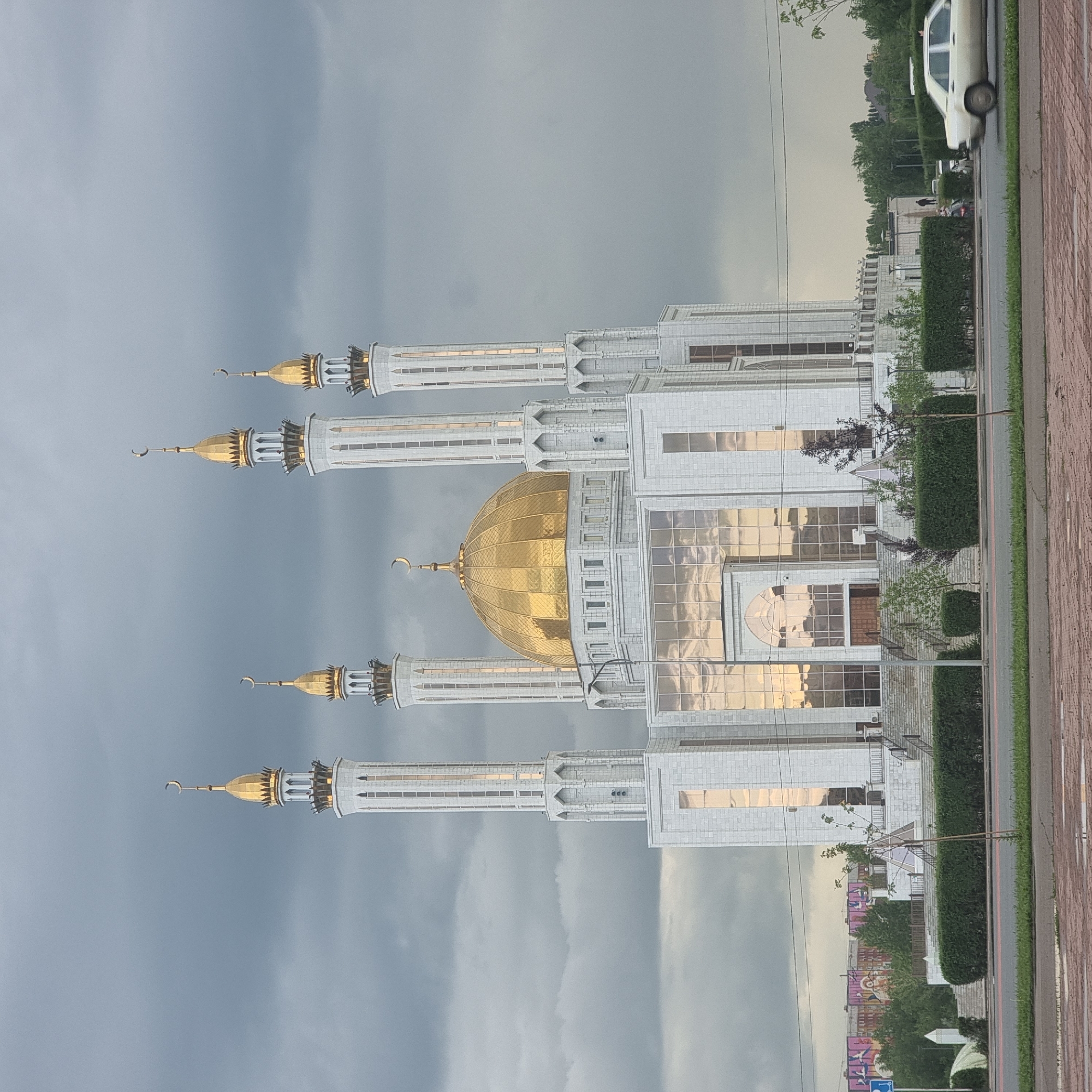 Afternoon stop at a mosque and spruce-lined grounds in Aktobe