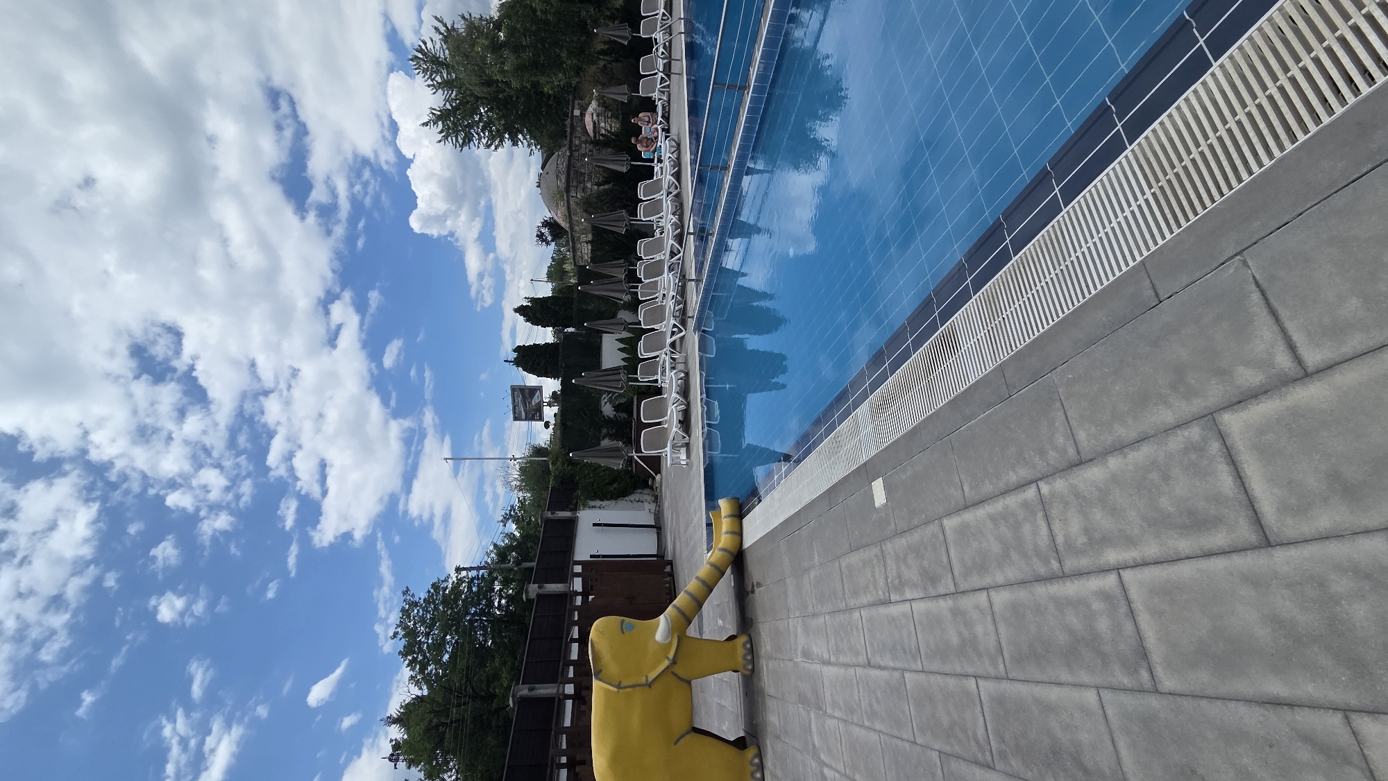 Poolside hangout in Bania, Bulgaria on a summer morning