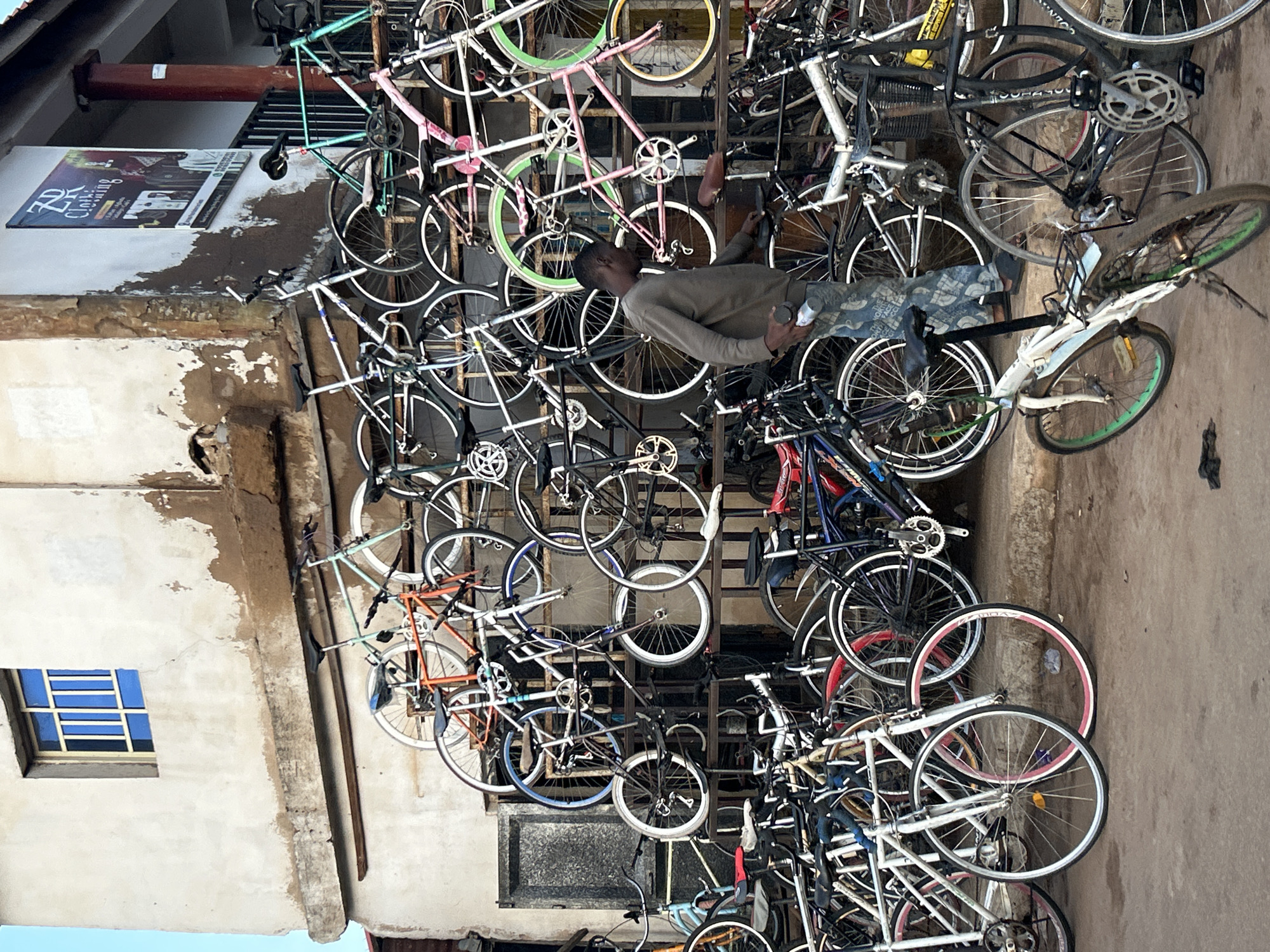 Daily life captured at Bukuru bicycle shop and street
