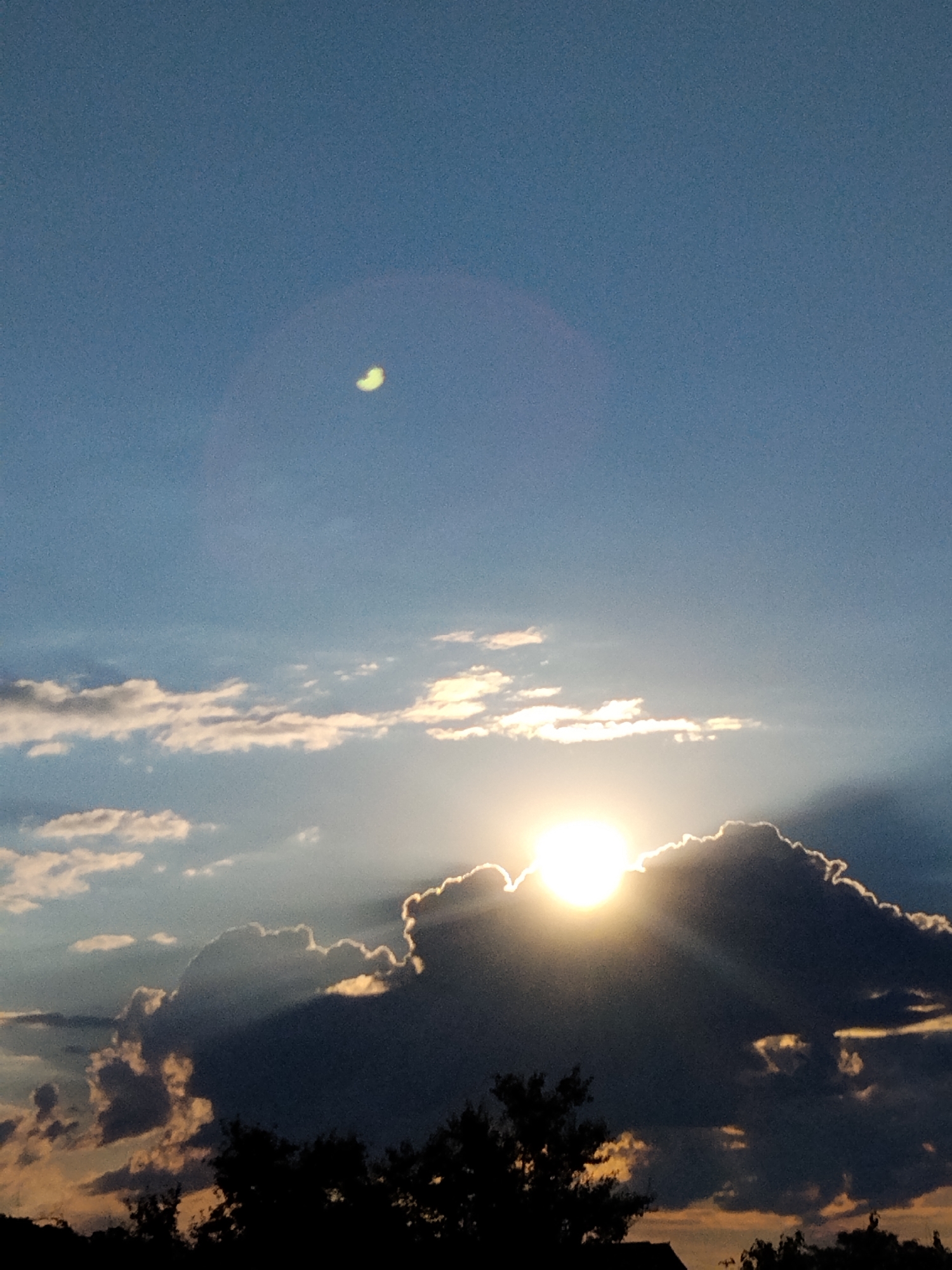 Sunset over Ustyvytsia, Ukraine, clouds and crepuscular rays