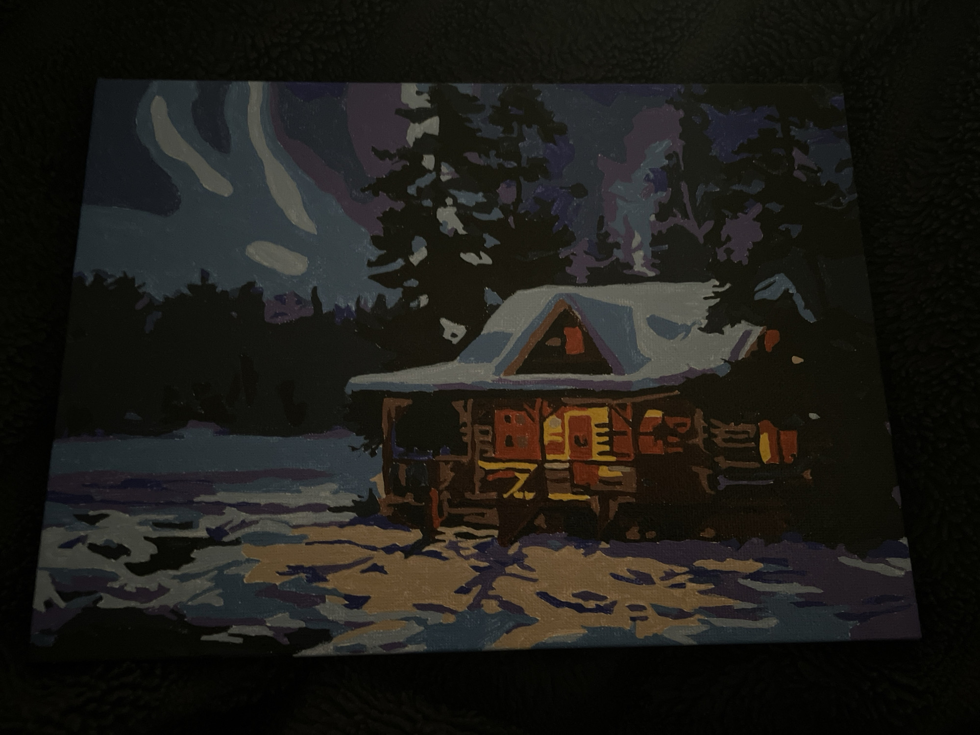 Witness observes winter cabin painting with block-color art style