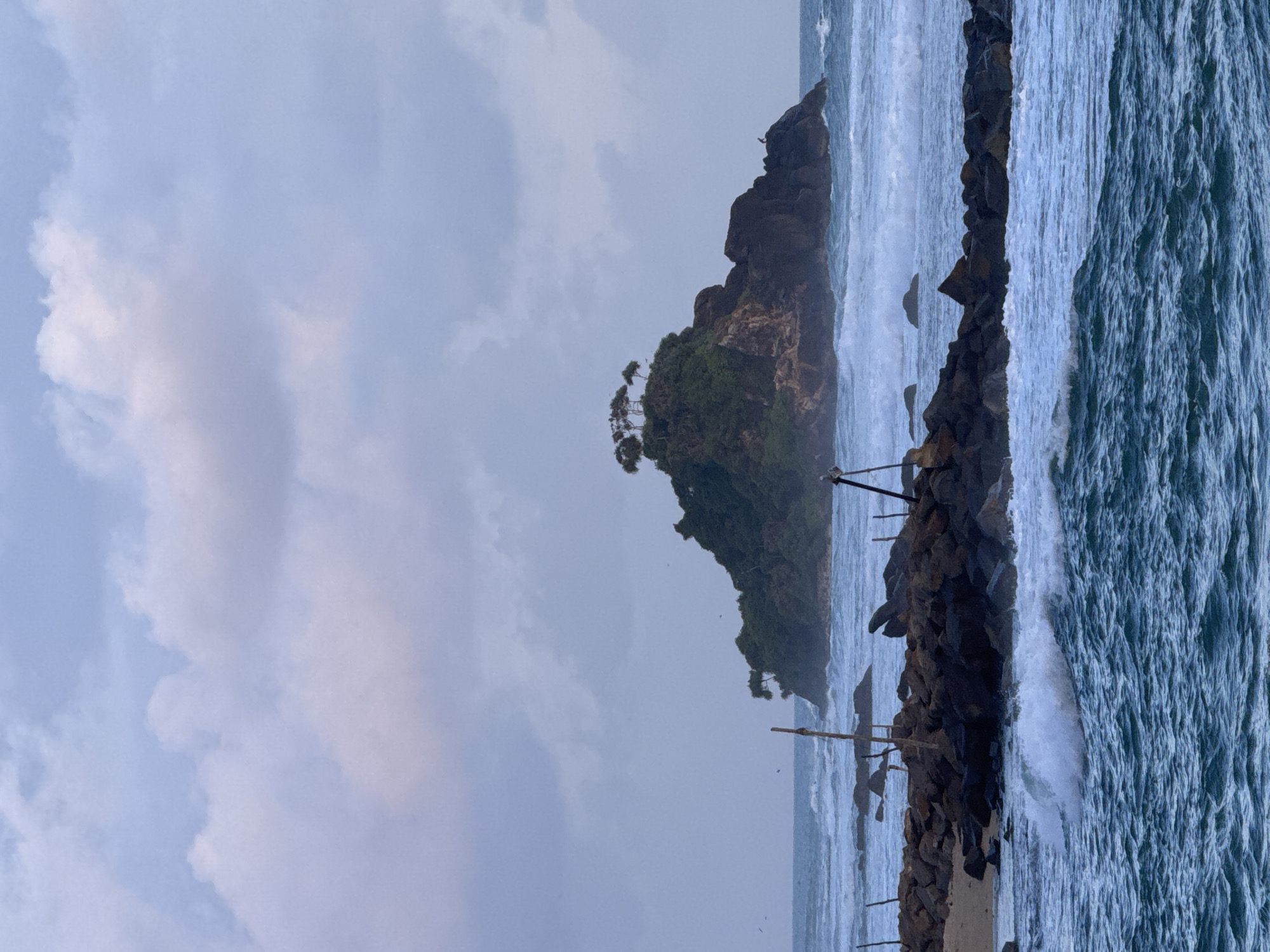 Sri Lanka's southern coast at golden hour — surf, palms, and village life