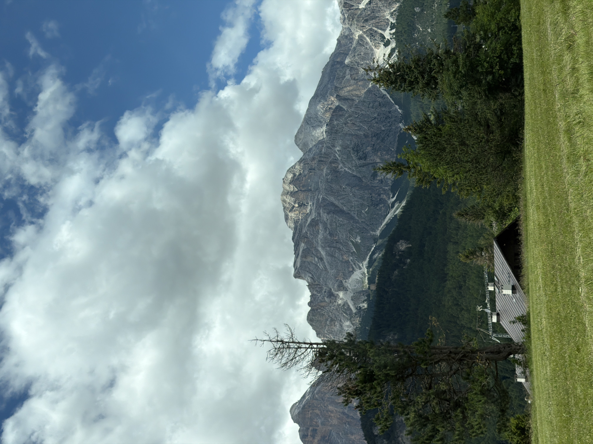 Morning road trip through alpine mountain terrain and hillside towns