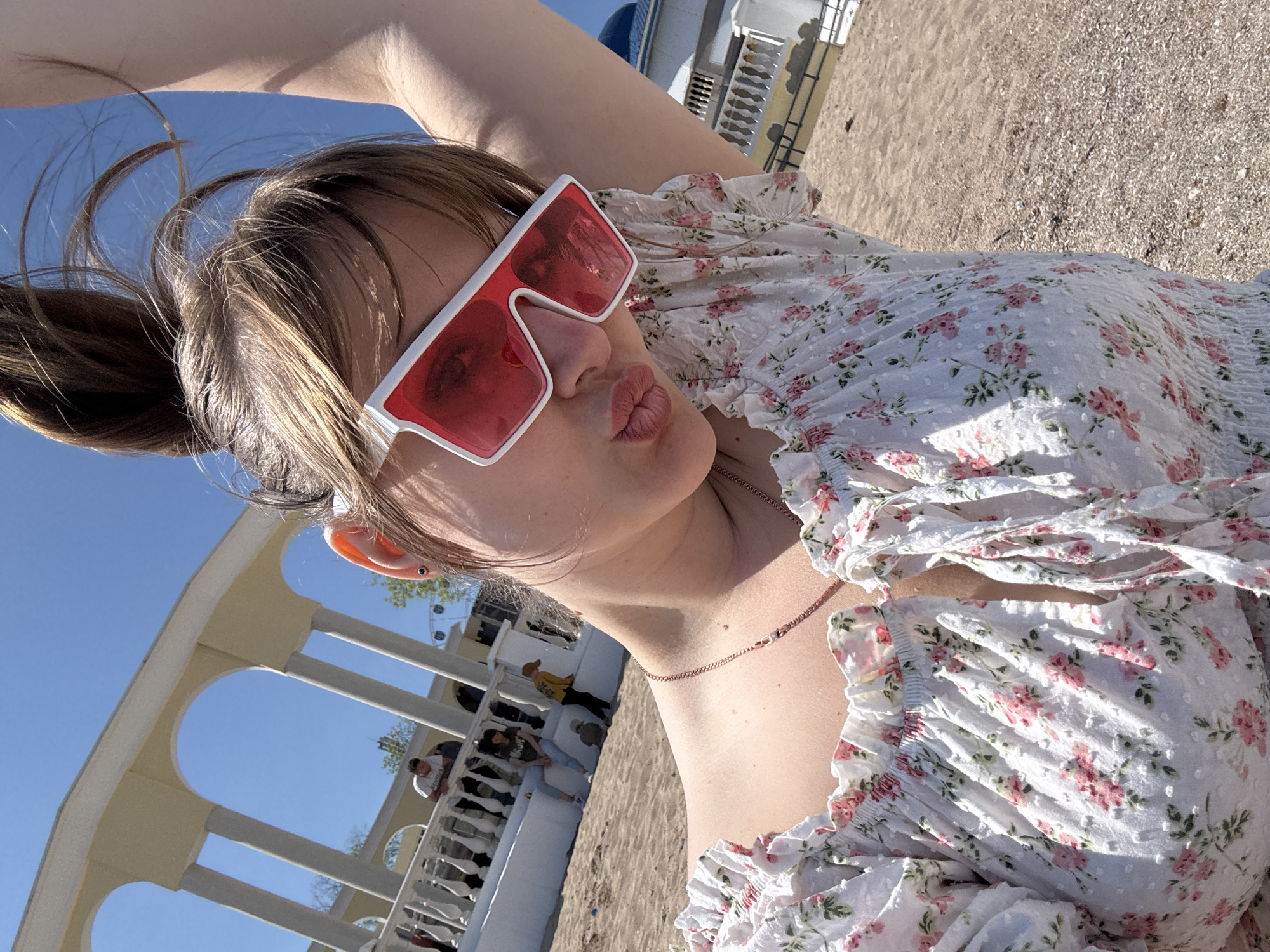 Woman takes selfie on Yevpatoriya beach in Ukraine