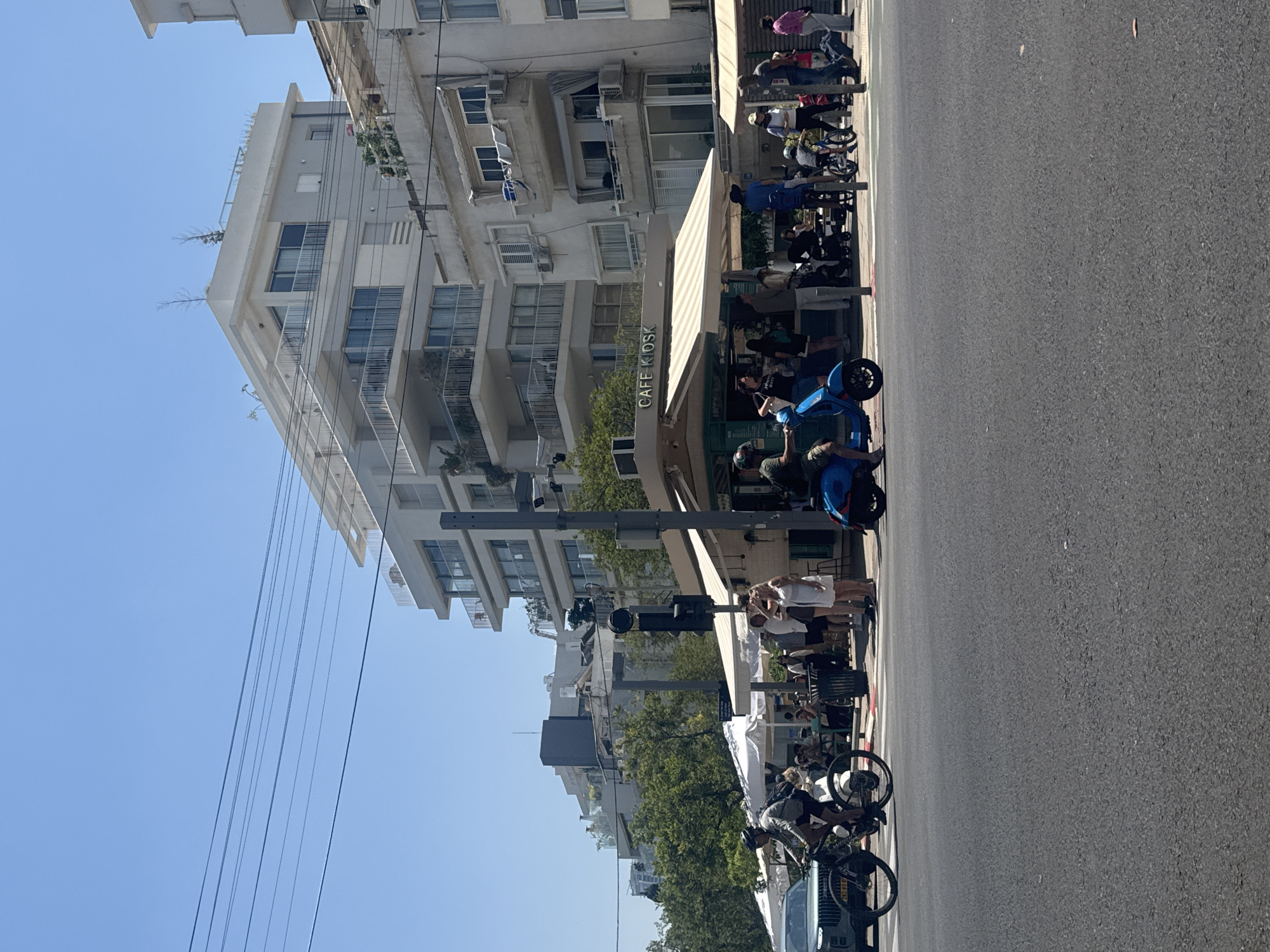 Morning street life documented across Tel Aviv neighborhoods