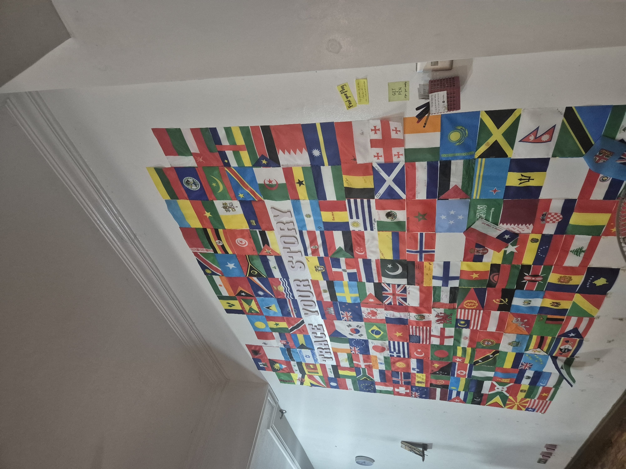 Interactive flag display invites visitors to trace their stories