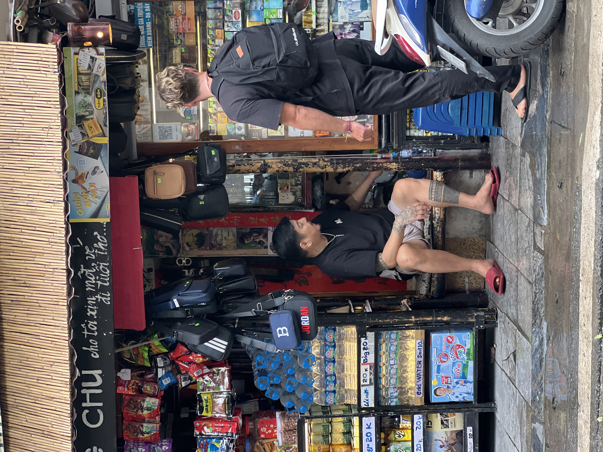 Hanoi street commerce and traffic on a busy morning