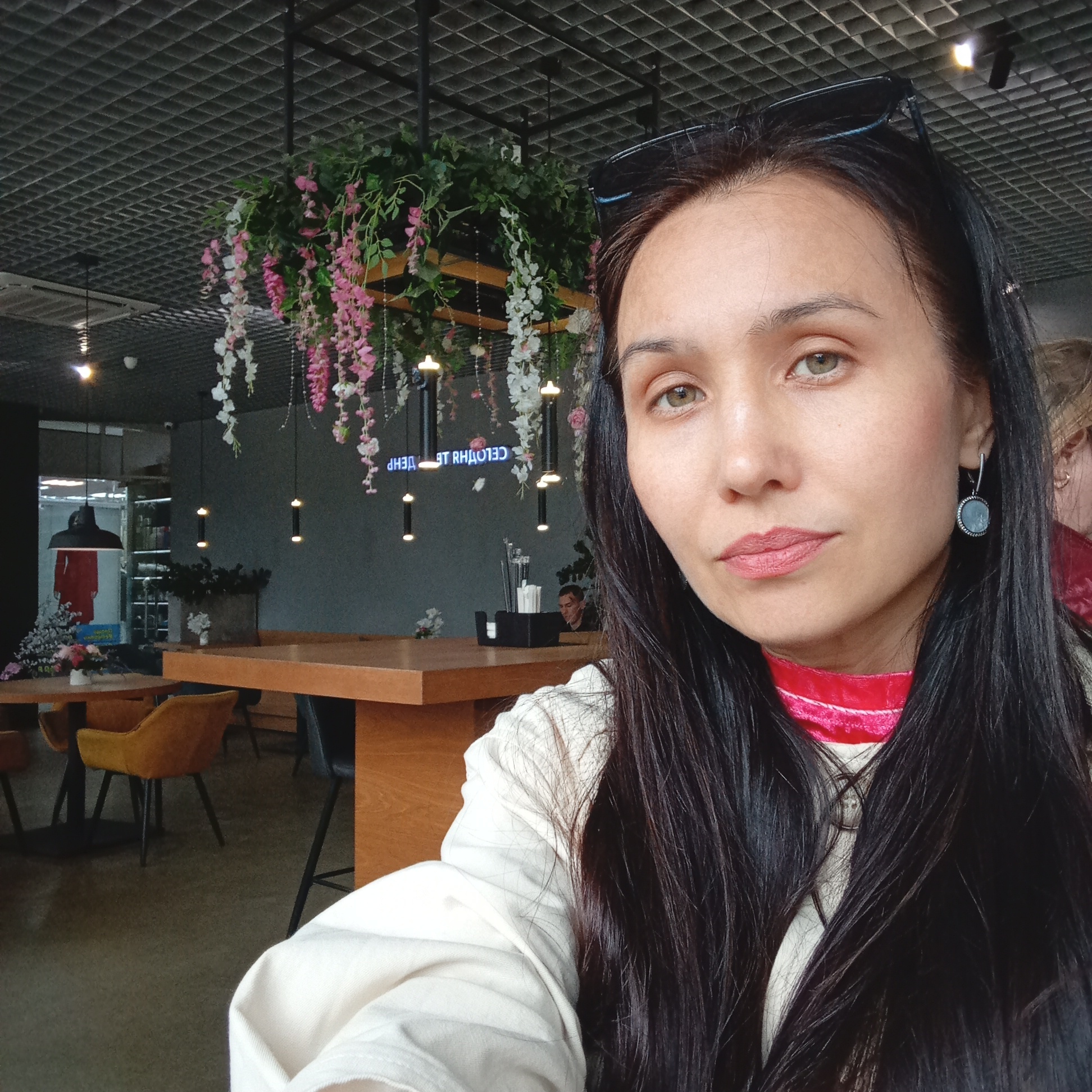 Woman documents afternoon outing in Pervomaysky, Russia cafes and arcade