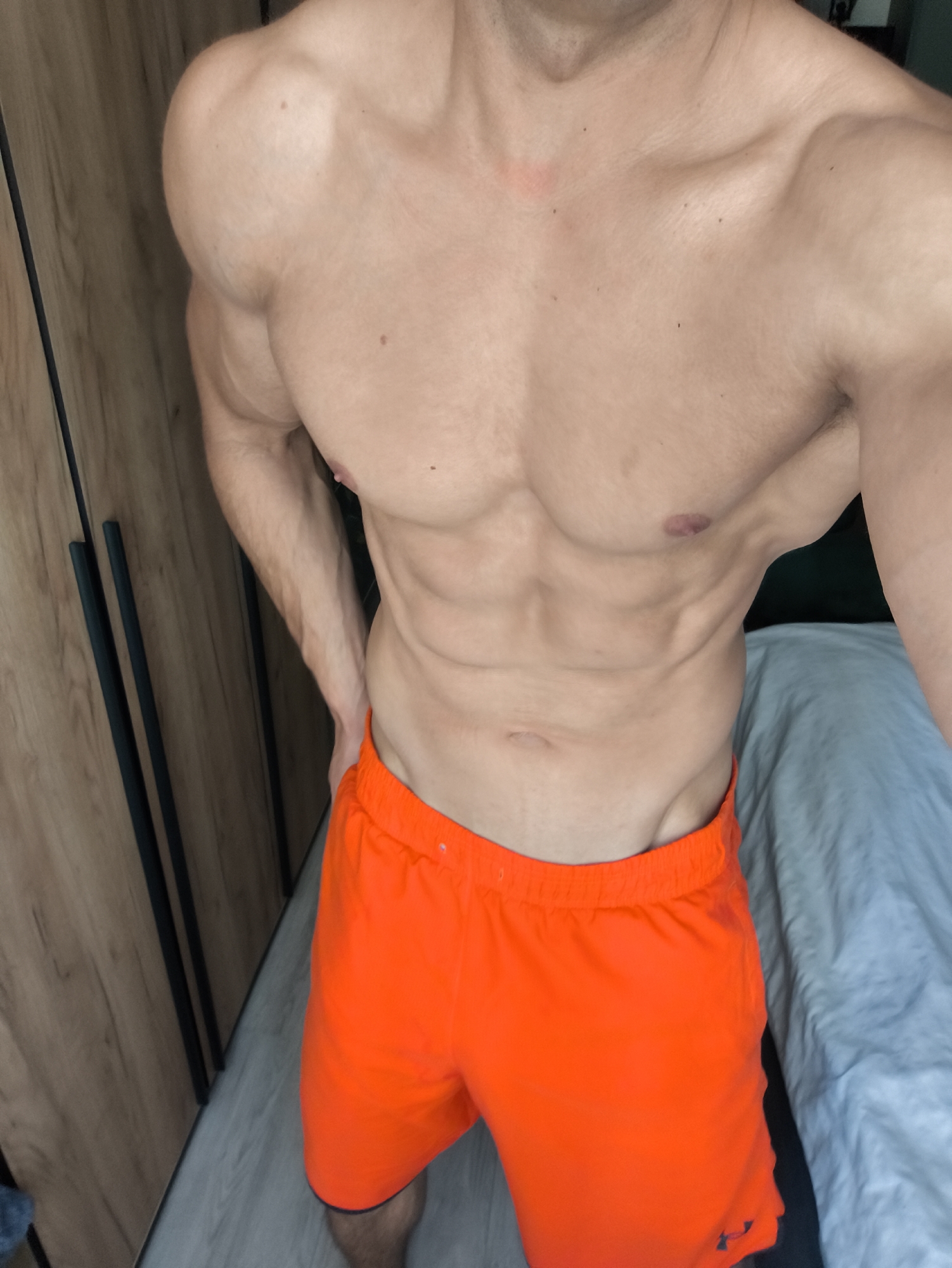 Muscular man observed indoors in Moscow