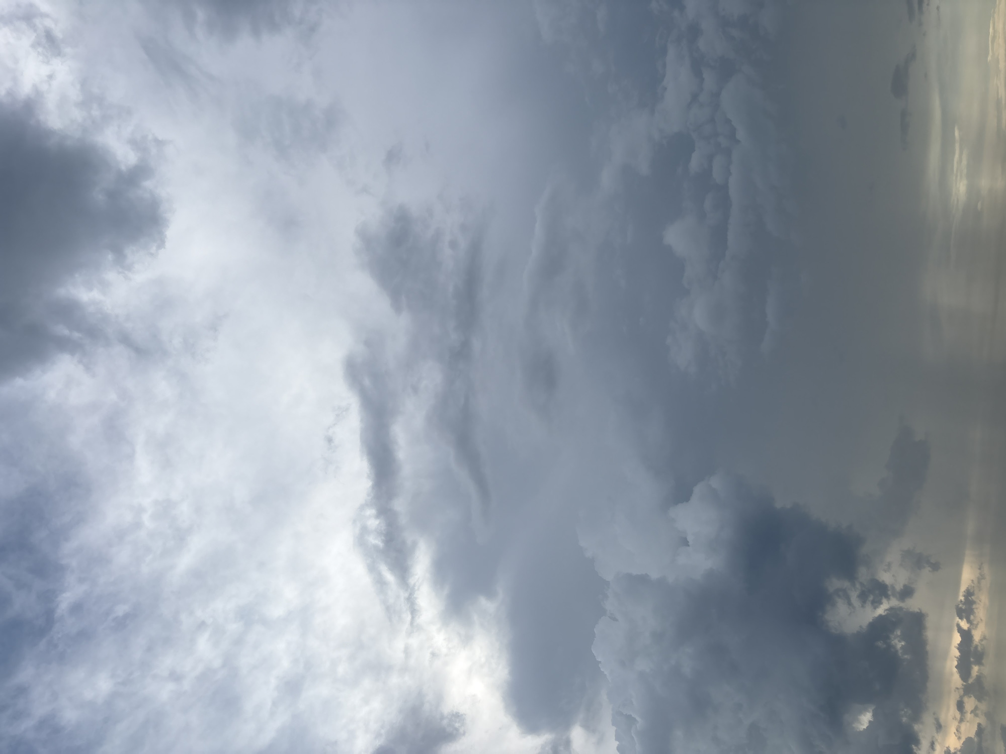 Stormy skies over a Florida subdivision and surrounding roads