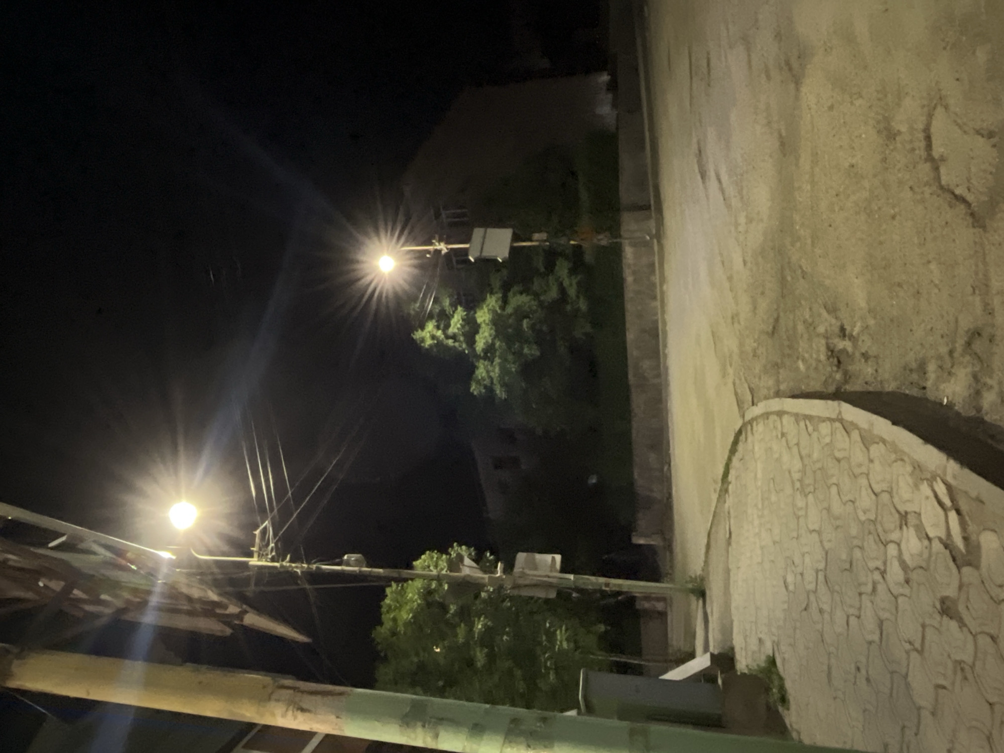 Quiet night streets of Yeghegnadzor, crescent moon overhead