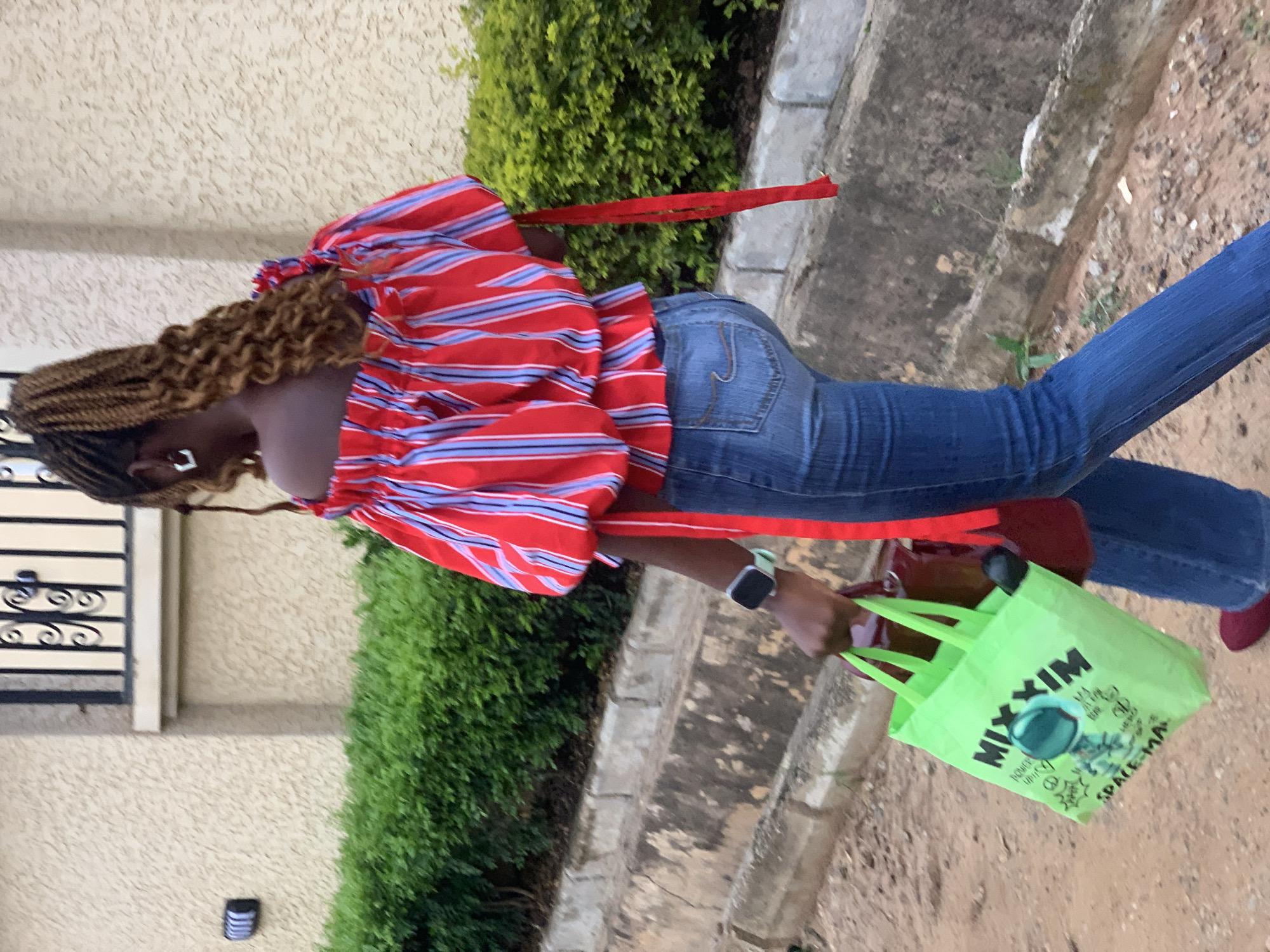 Morning street life on a residential road in Abuja