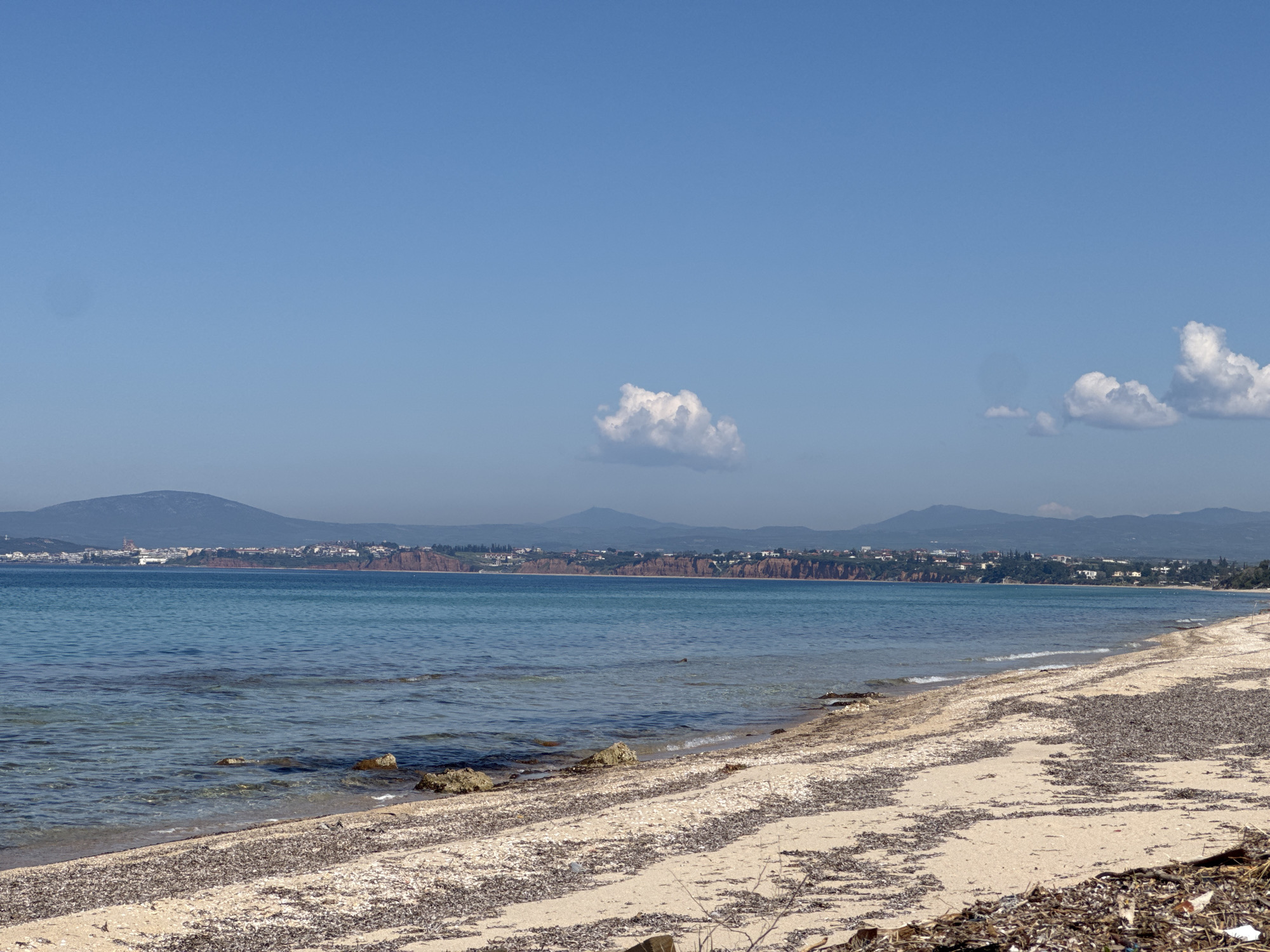 Clear morning beach scene documented in Nea Potidea, Greece