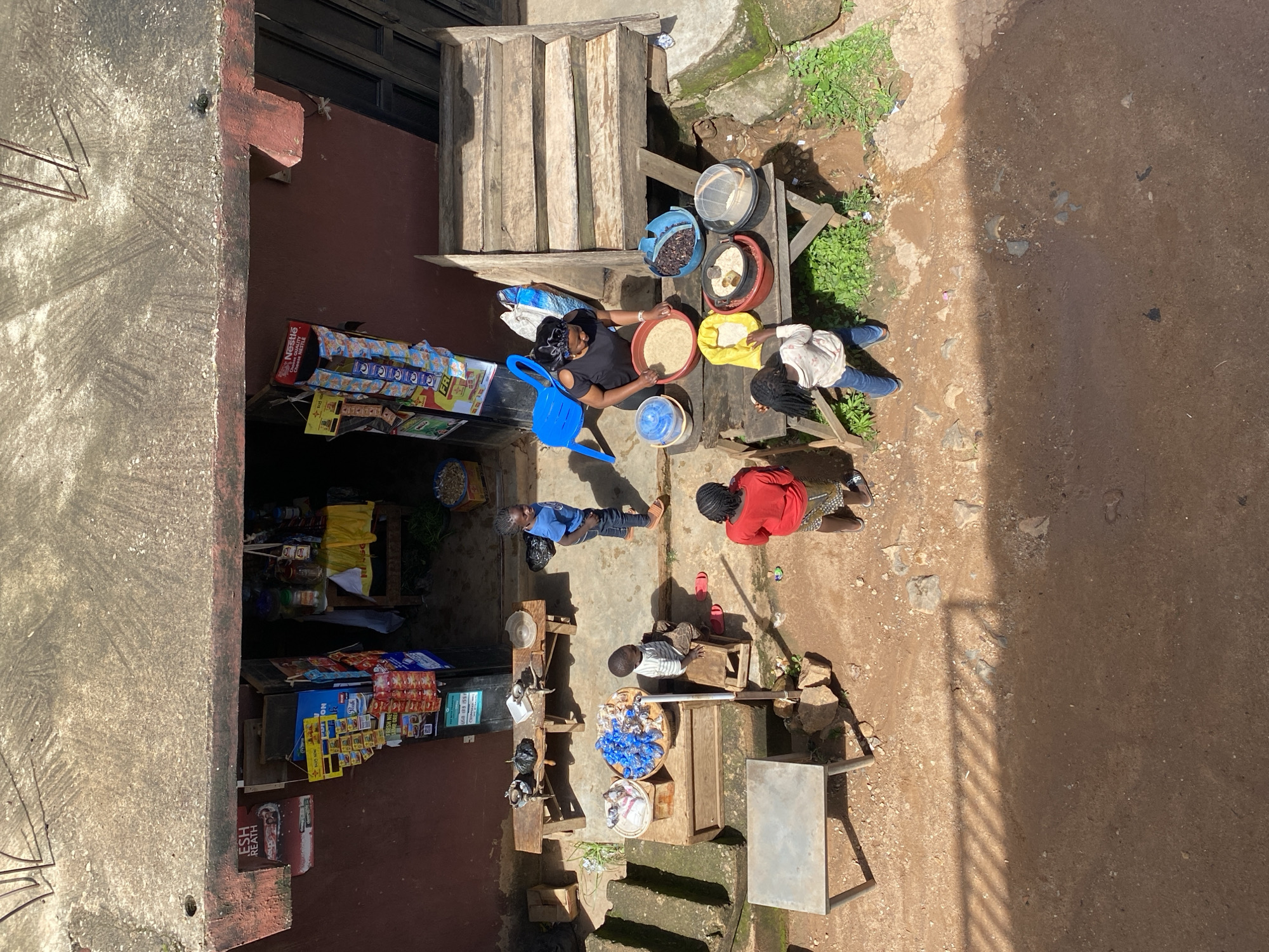 Gwong market scene, stalls and rooftops from ground to sky