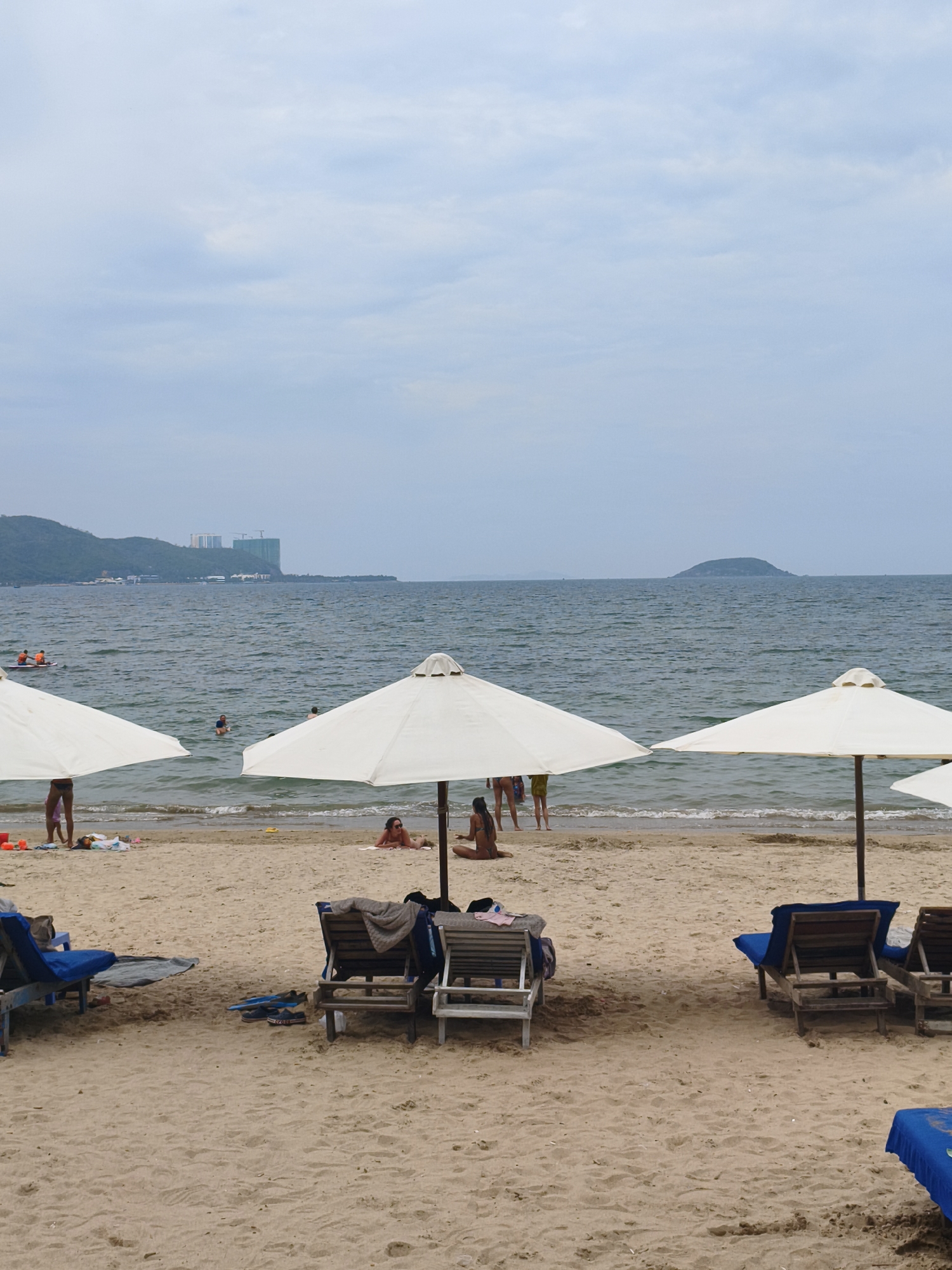 Nha Trang beach and city life on a cloudy morning