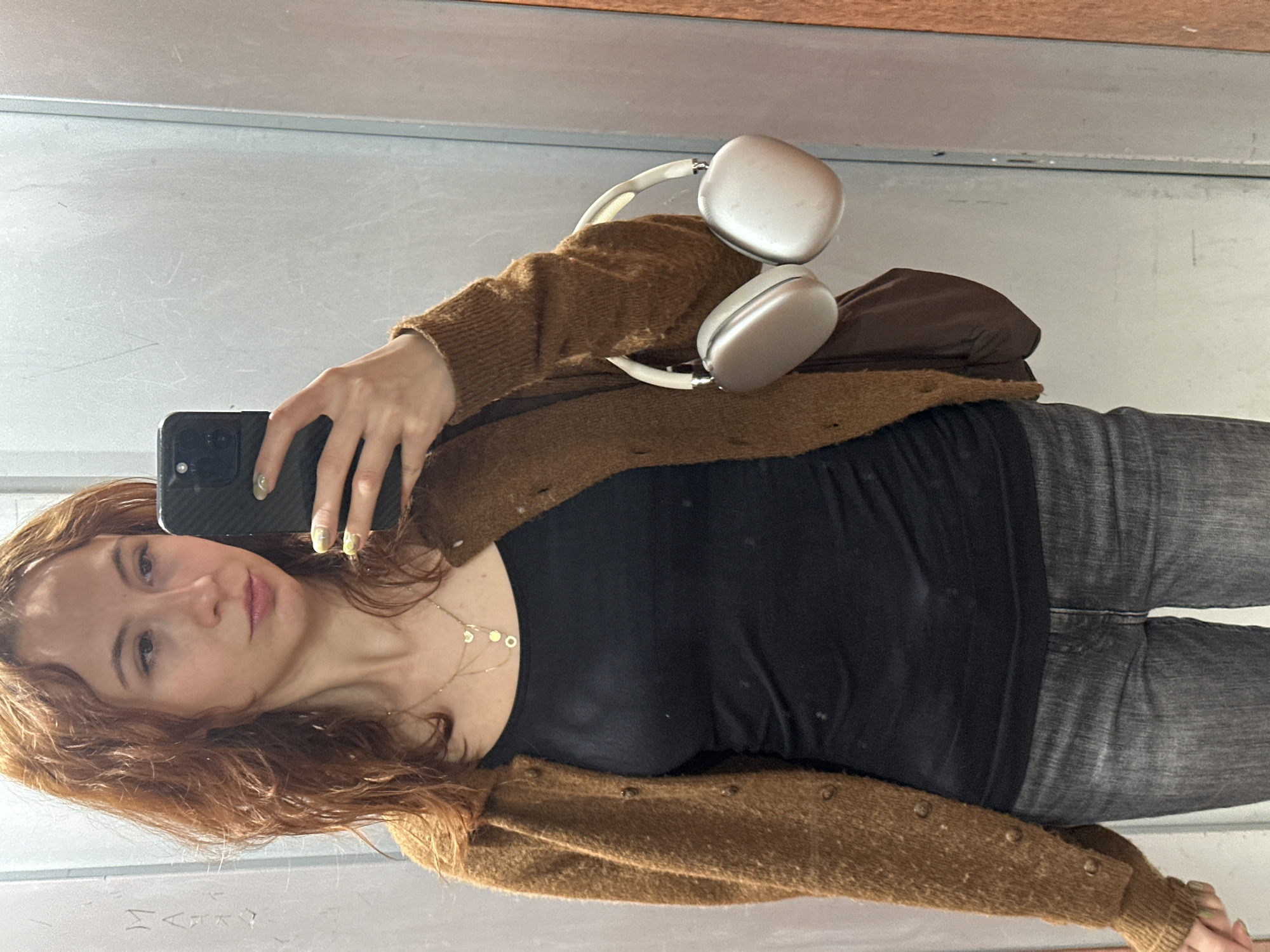 Woman takes selfie in fitting room, Novi Sad