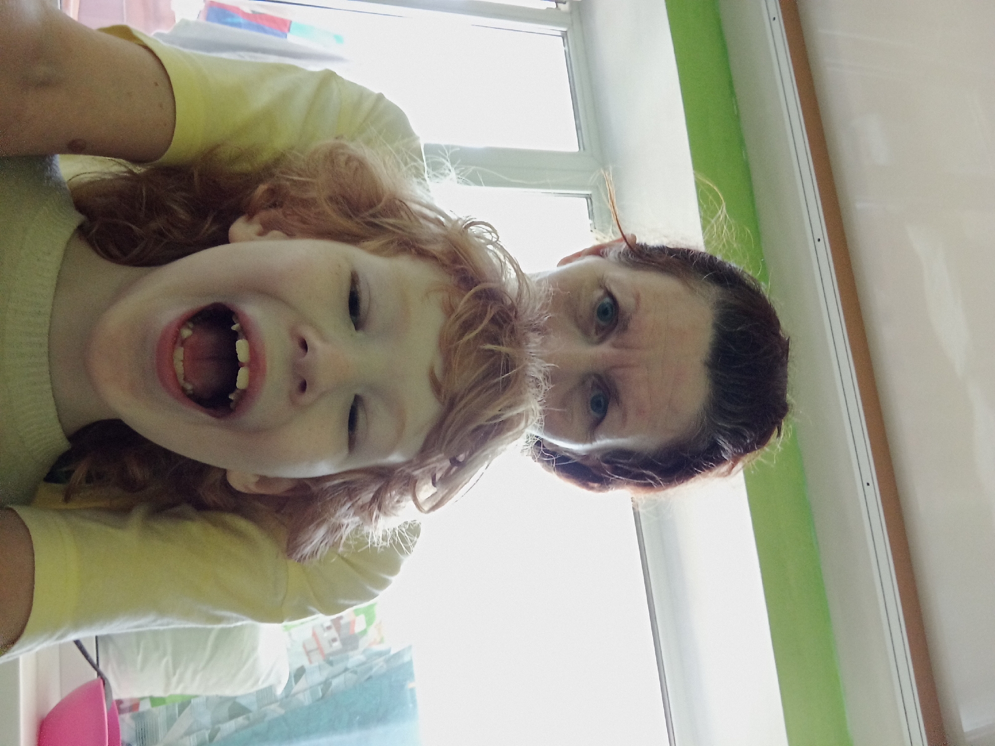 Lazy morning at home in Blagoveshchensk with a red-haired kid