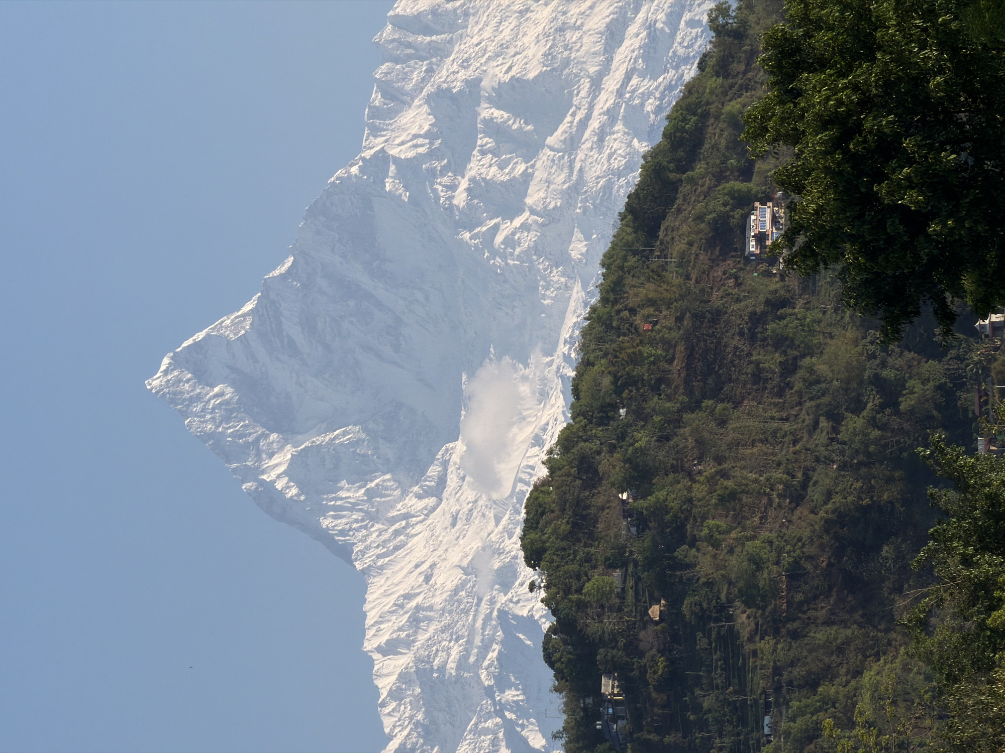Helicopter spotted over misty mountains near Pokhara, Nepal