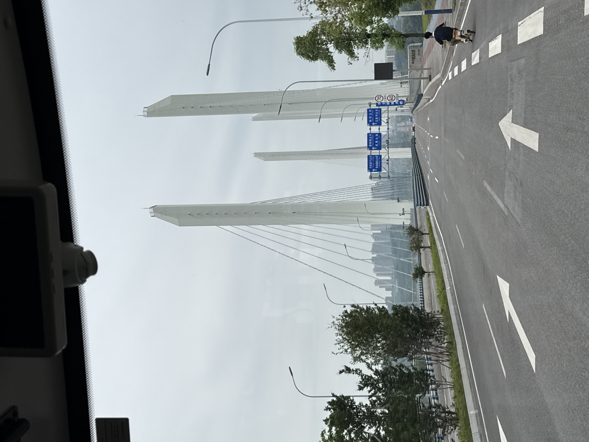 Morning commute captured near cable-stayed bridge in Liangjiang