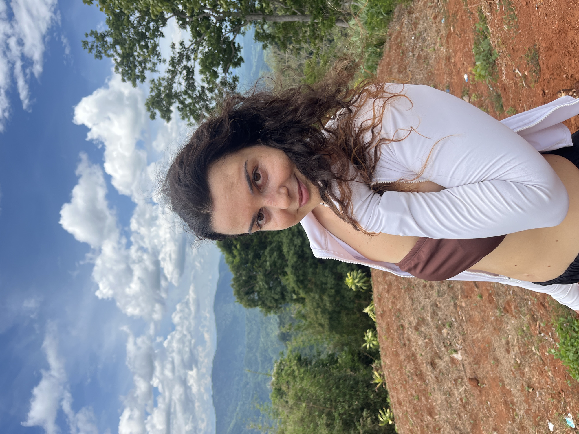 Hilltop stop in Nao Sẻ with mountain views and a red shaker bottle