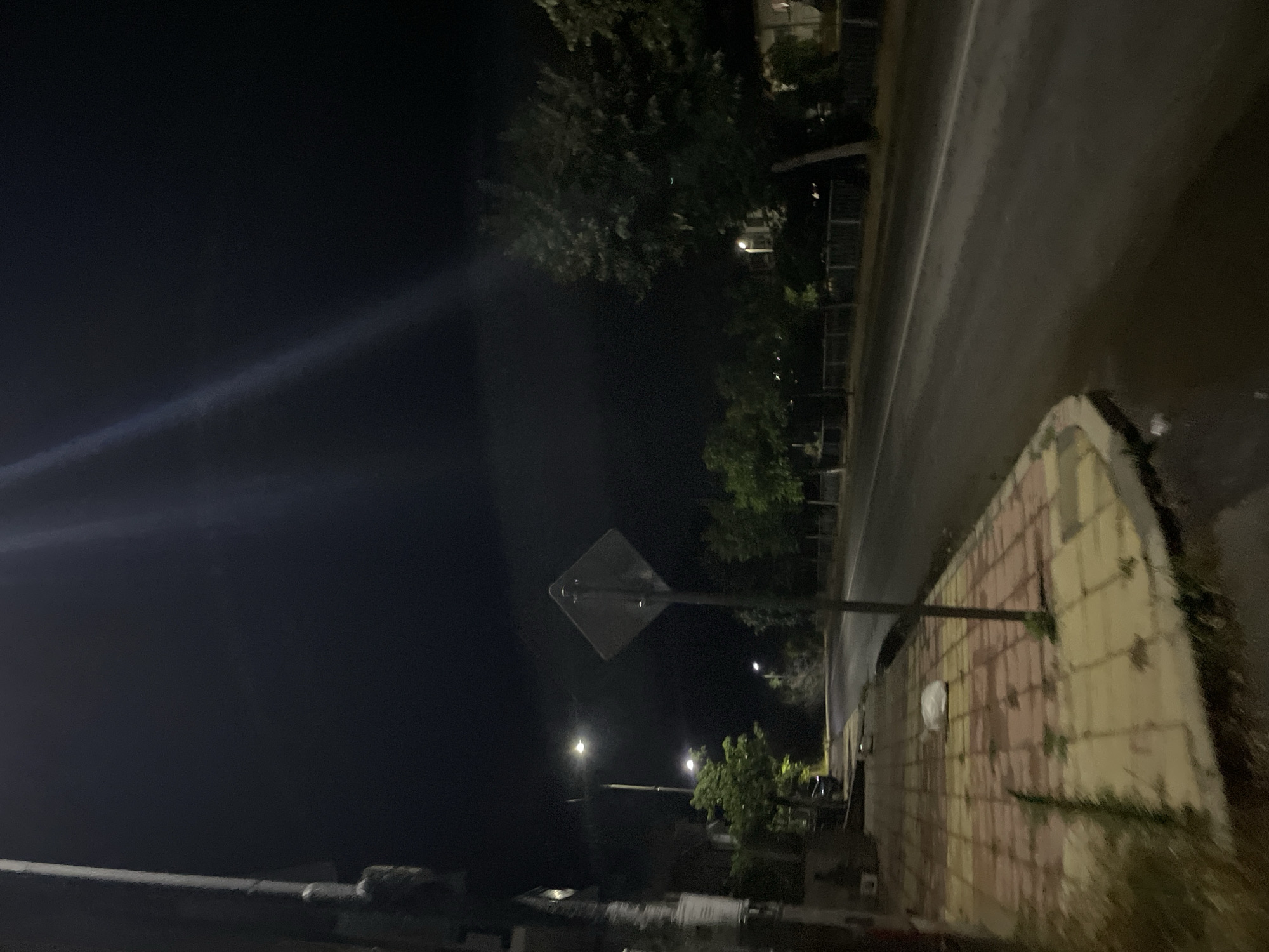 Wet streets and parked cars on a quiet Zlatograd night