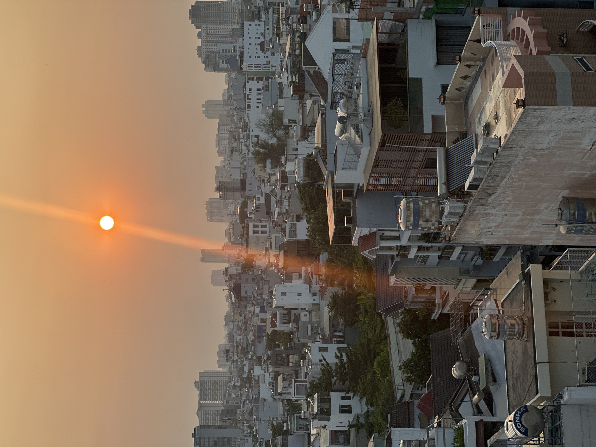 Sunset observed over Ho Chi Minh City urban landscape