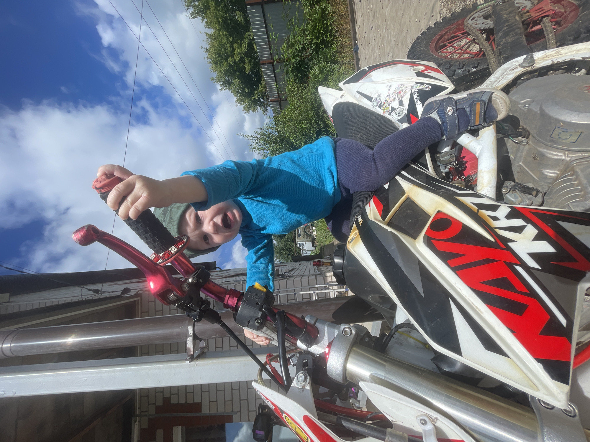 Kid on a dirt bike in rural Russia