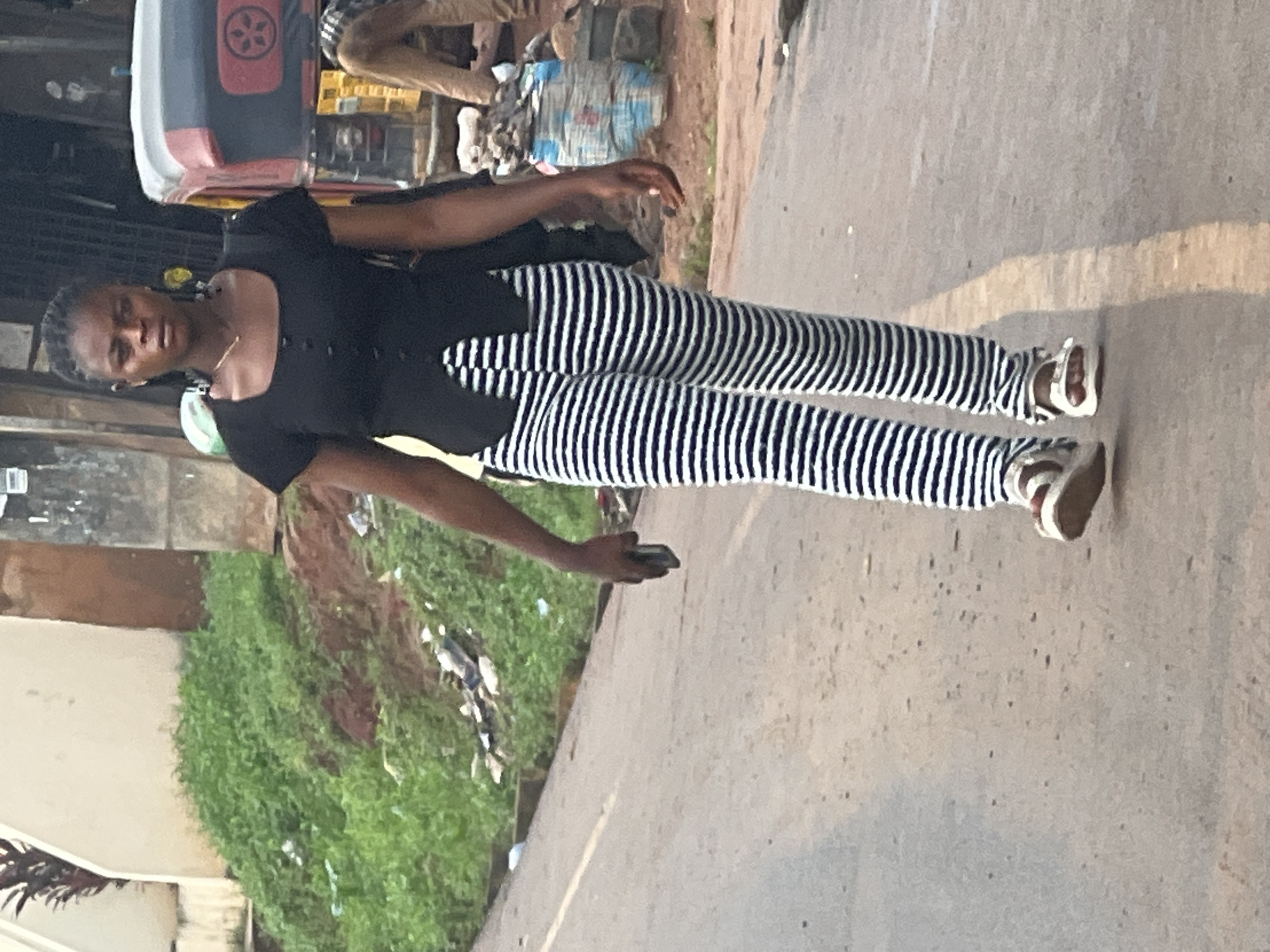 Morning street life and roadside repairs in Nkpor, Nigeria