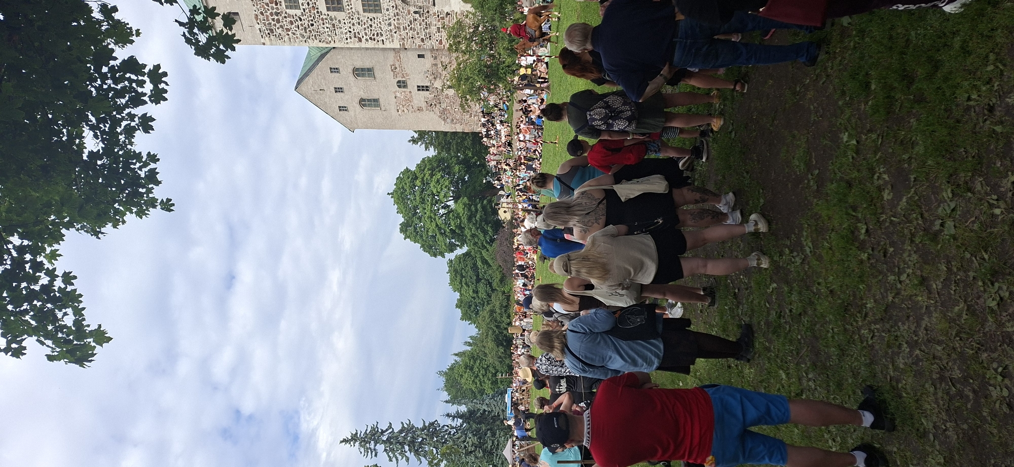 Medieval reenactment day at Turku Castle with markets and horseback riders