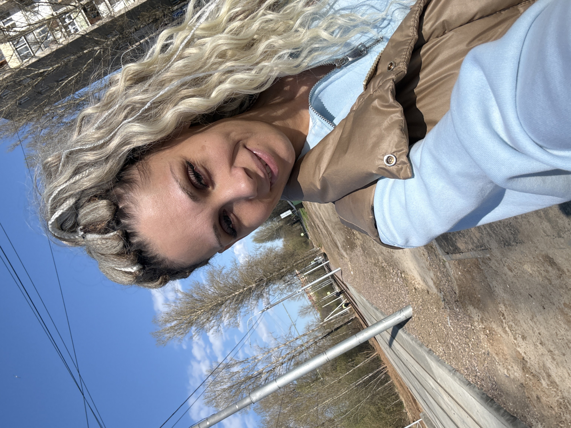 Woman documents morning outing with child in Rusanovo parks
