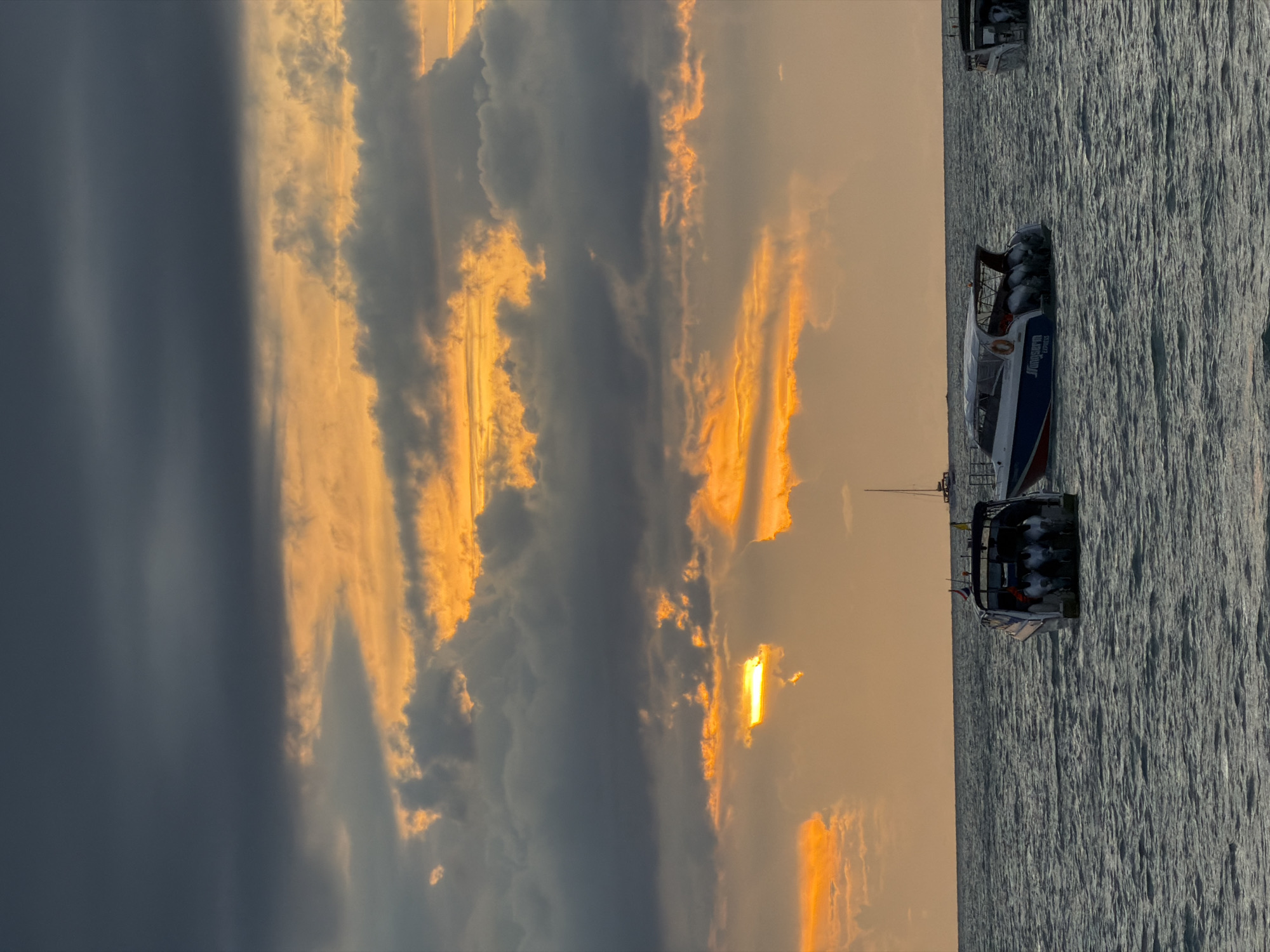 Sunset hour at Baan Bang Rak's pier and beachfront