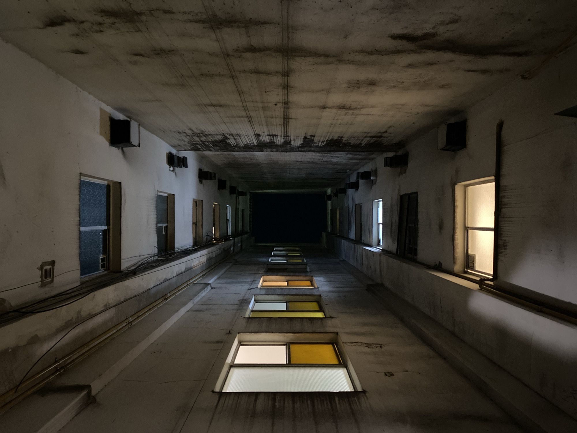 Concrete corridor photographed from below in Buenos Aires