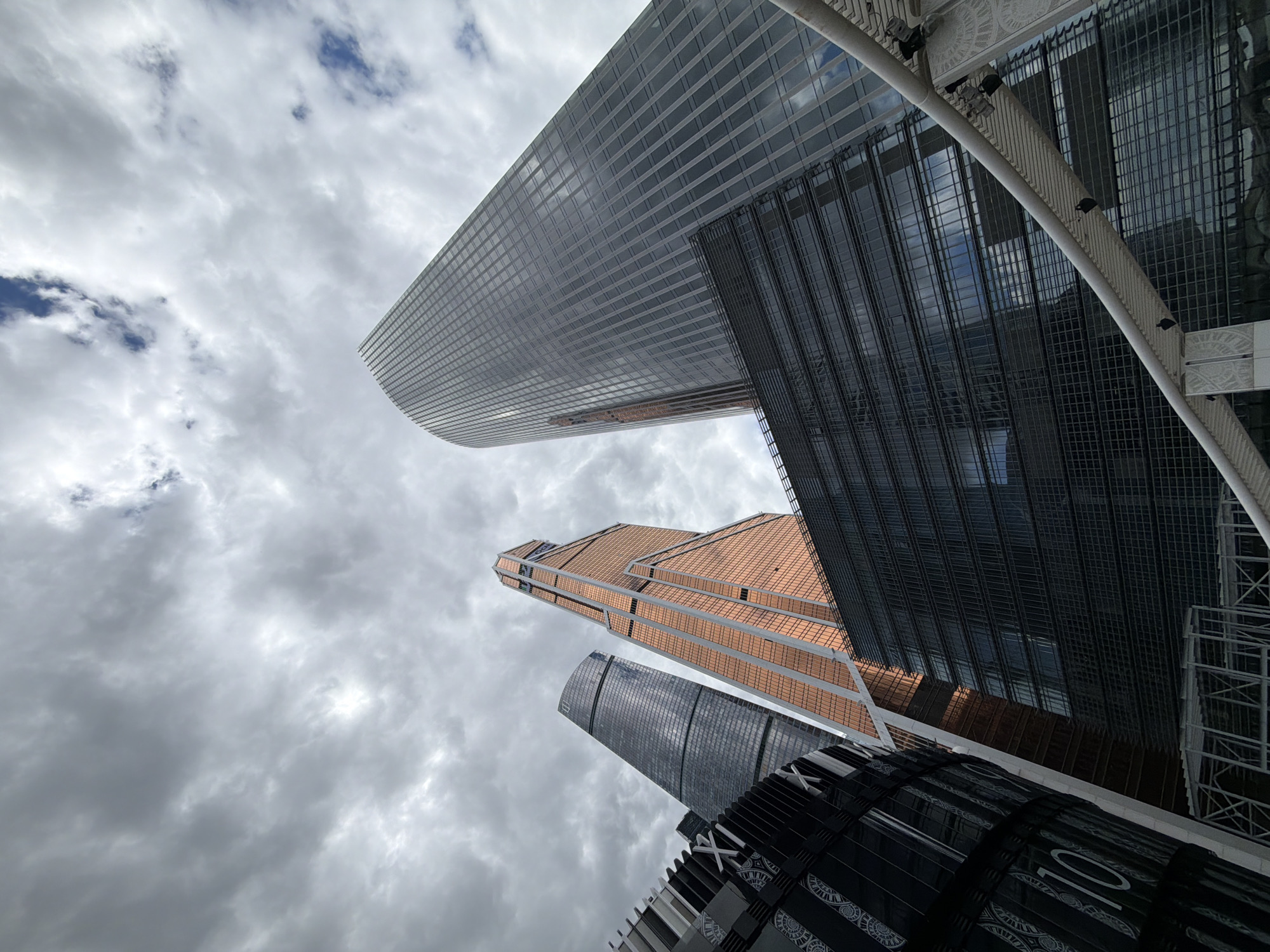 Modern Moscow skyscrapers photographed under cloudy afternoon sky