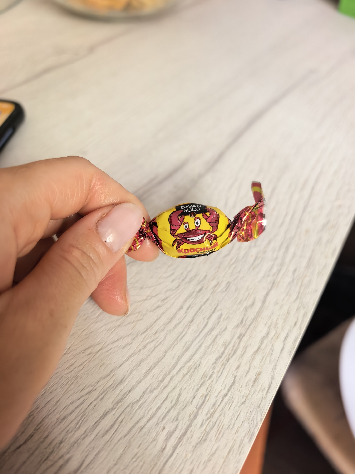 Child and baked goods captured in Sterlitamak home scene