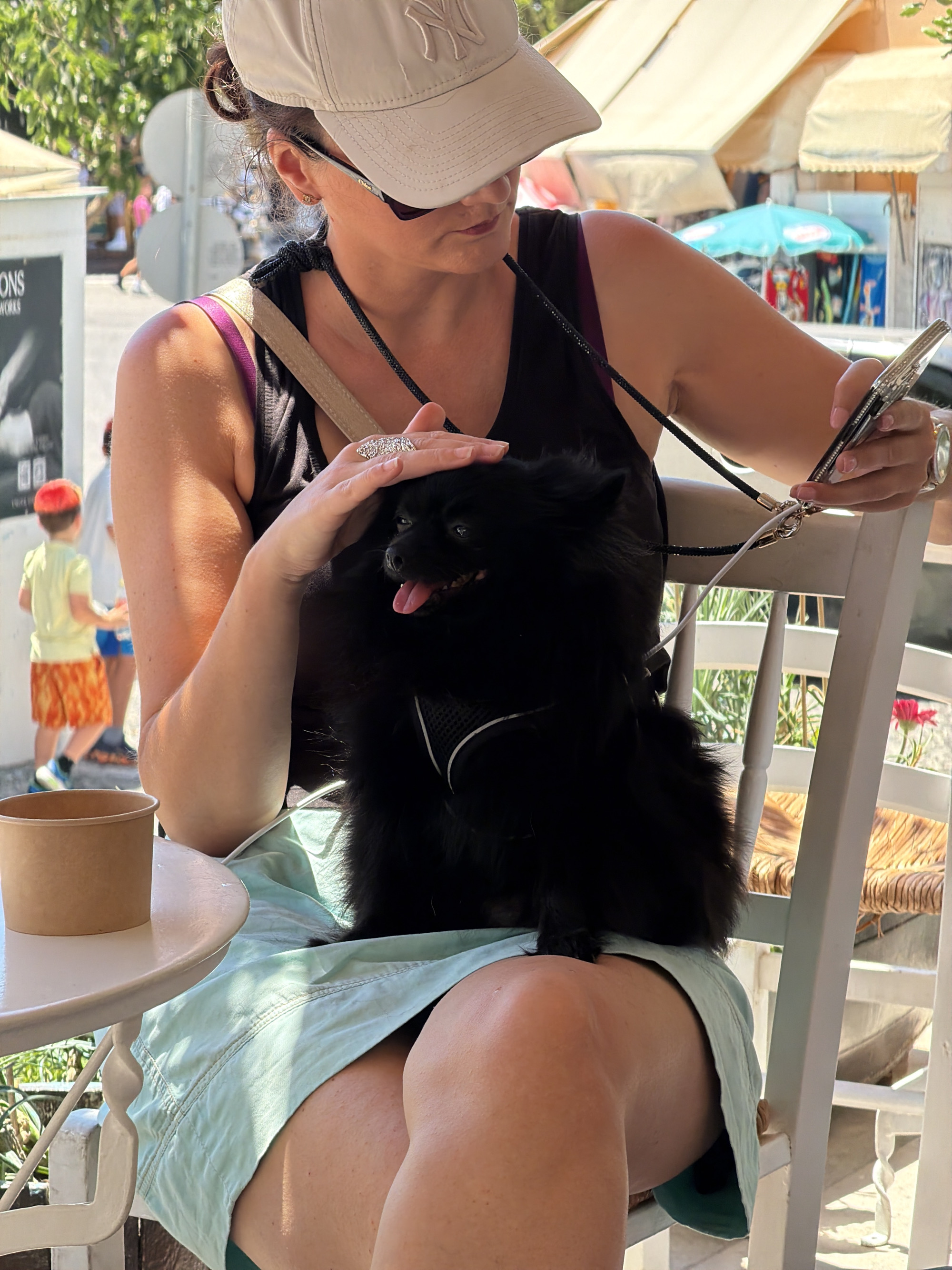 Slow summer morning in Thira — coffee, donkeys, cats, sea views
