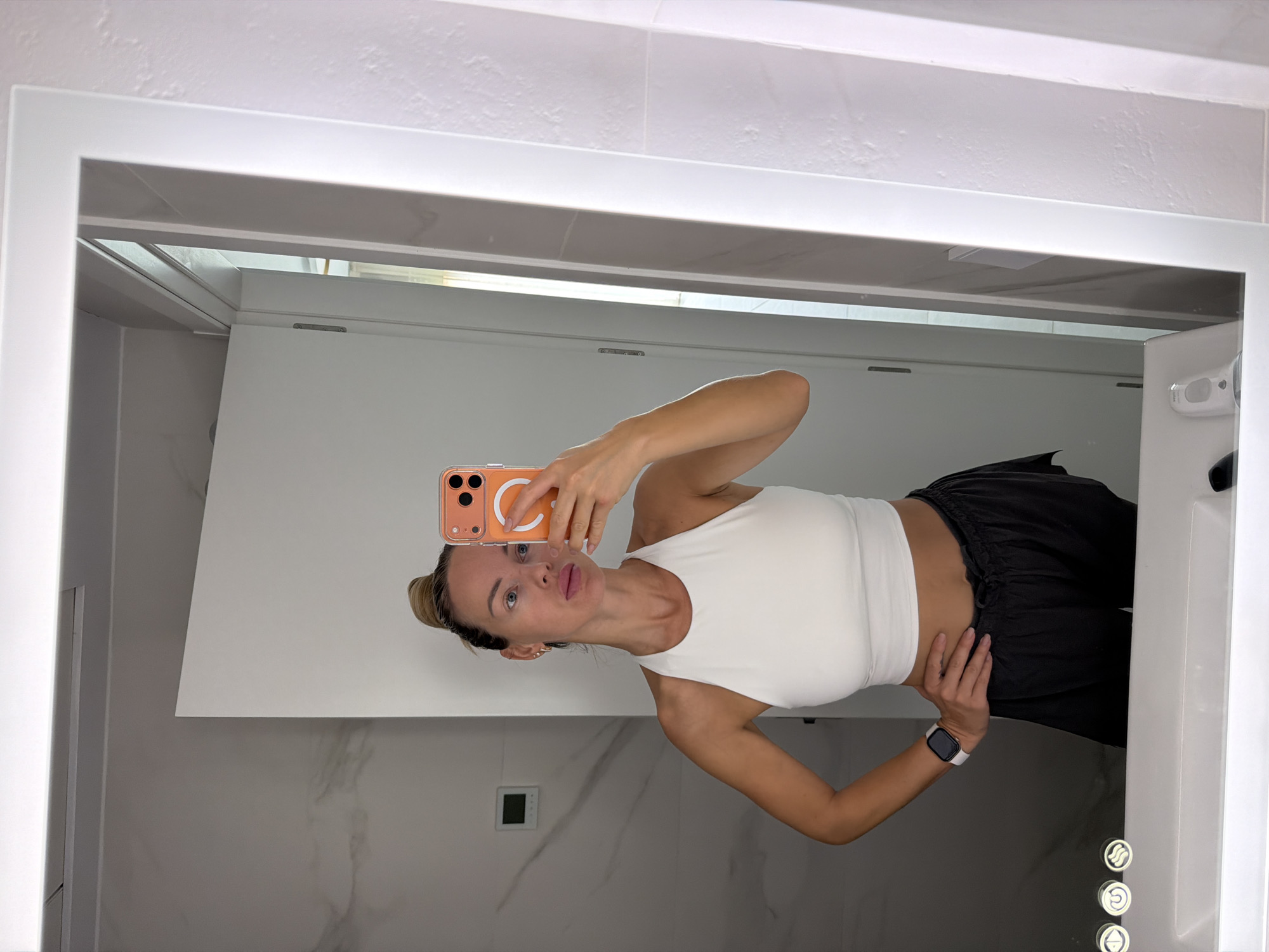 Mirror selfie session in a Finestrat bathroom