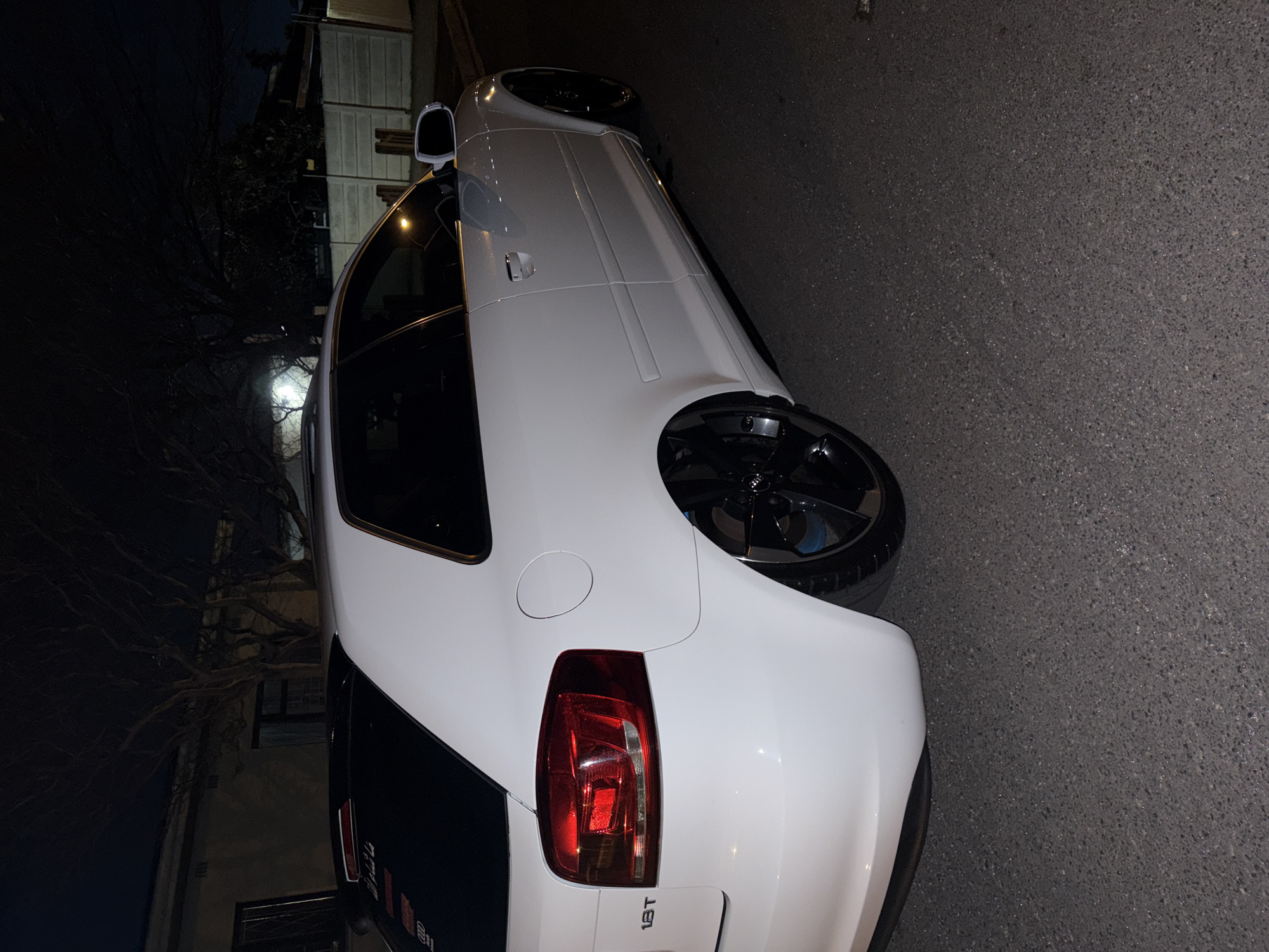 Modified white Audi A3 spotted on a Goodwood street at night