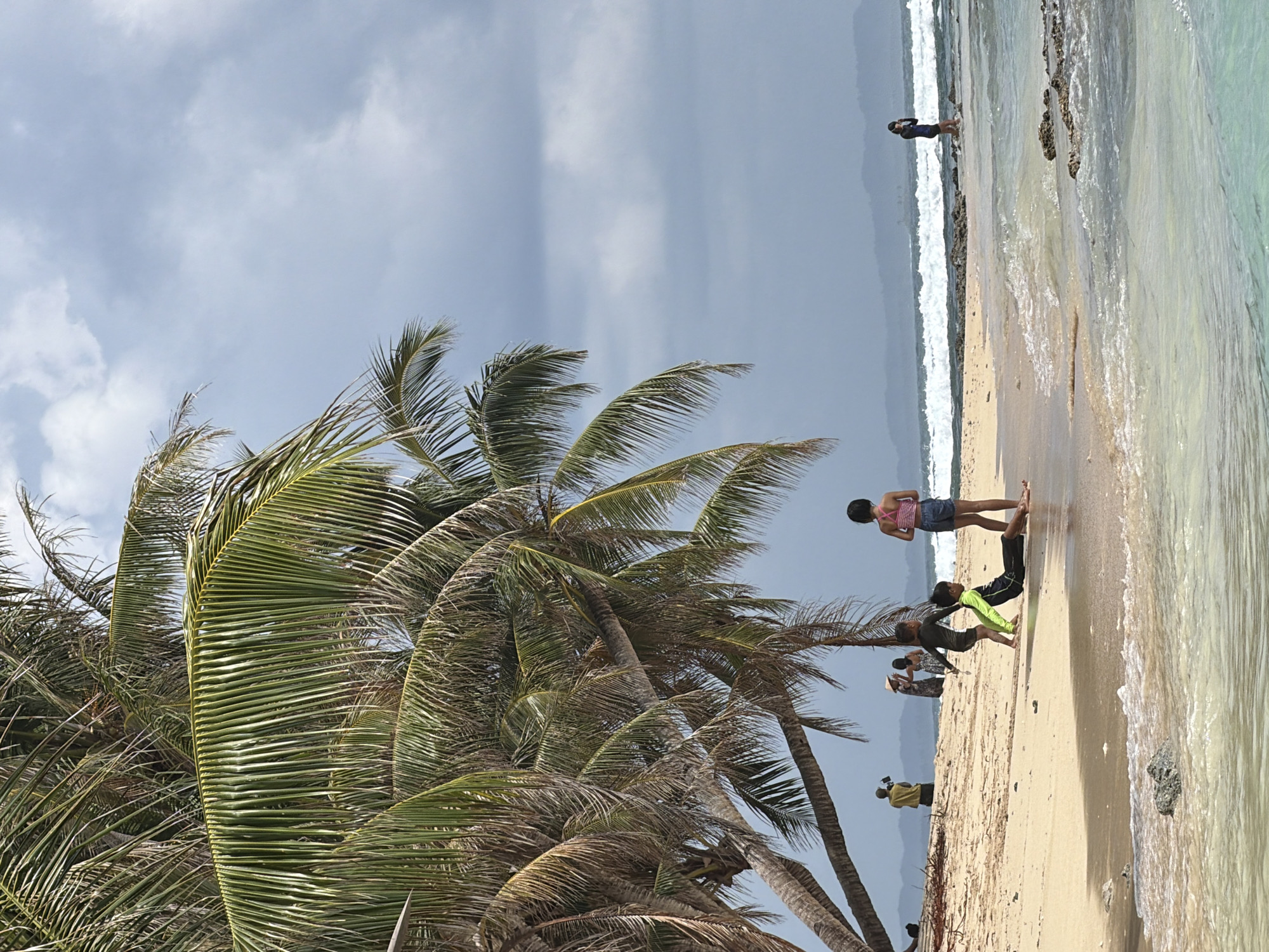 Tropical beach scene documented in General Luna, Philippines