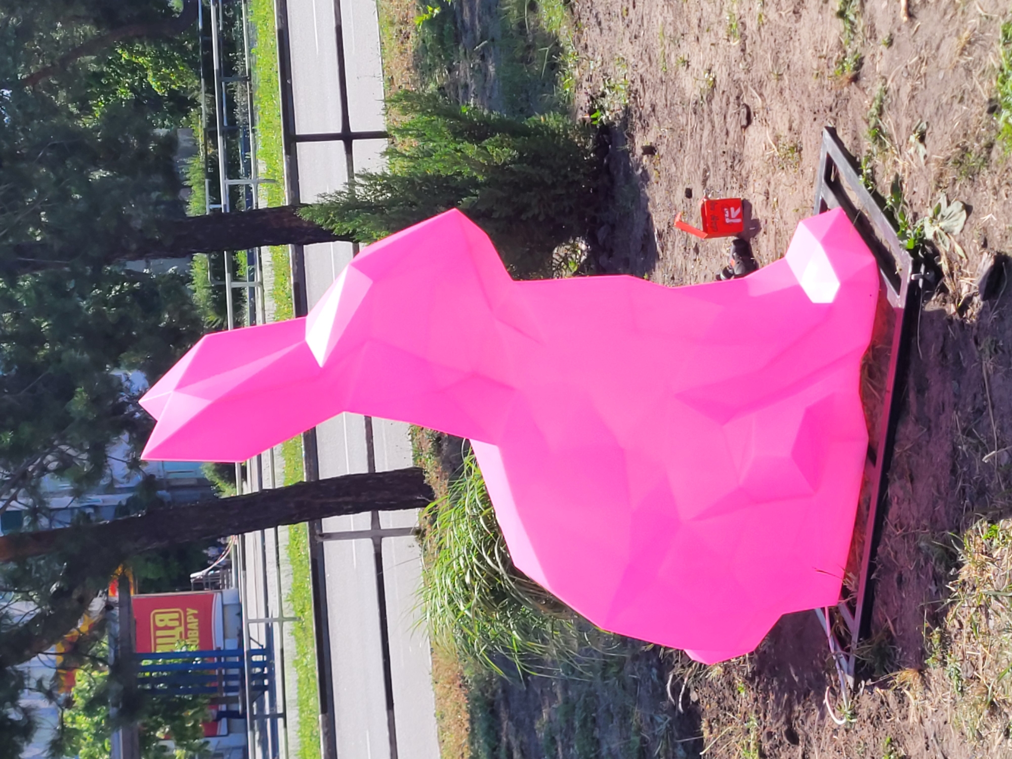 Pink rabbit sculptures displayed outdoors in Horishni Plavni, Ukraine
