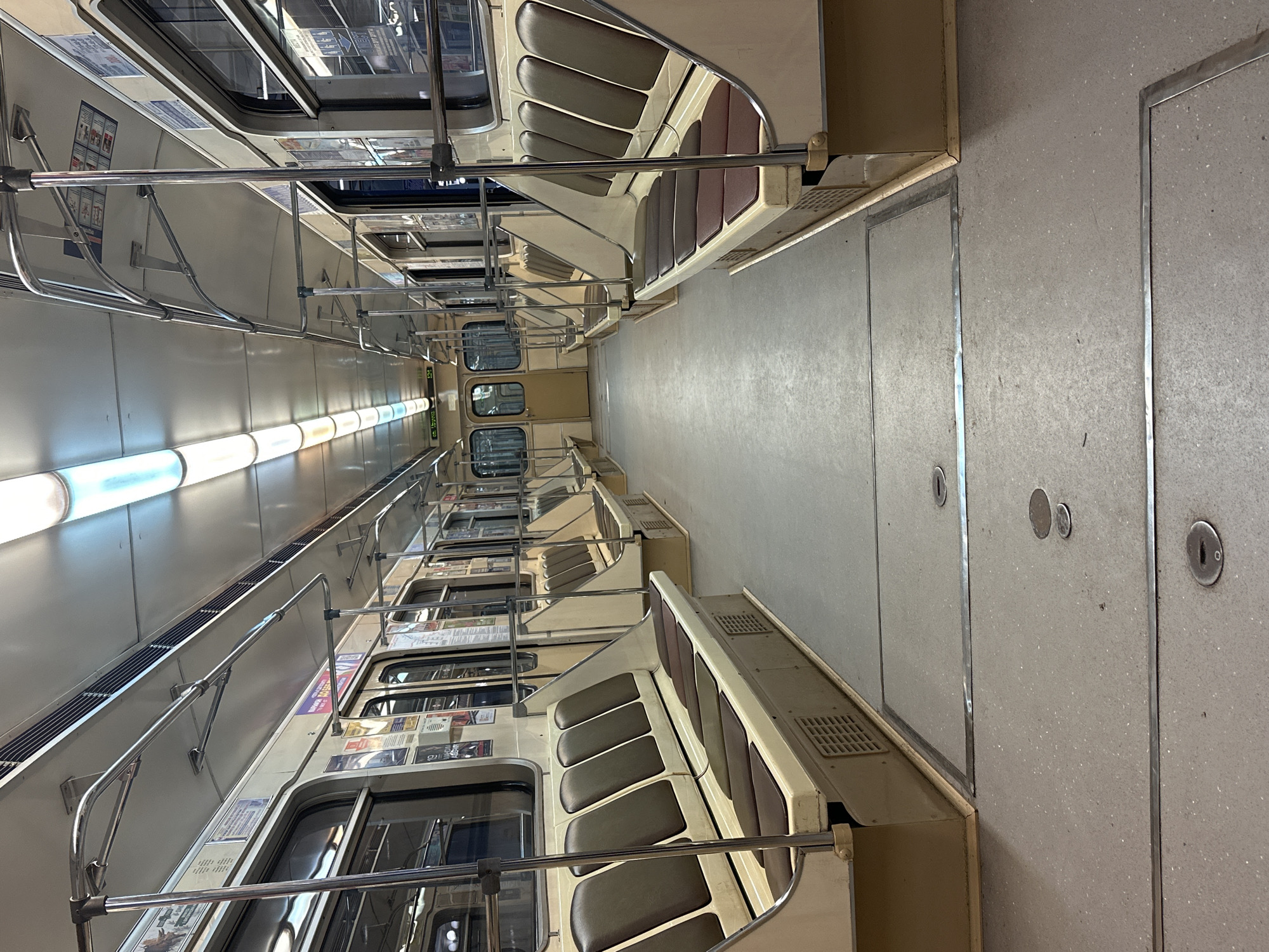 Evening commuter documents empty Minsk subway cars