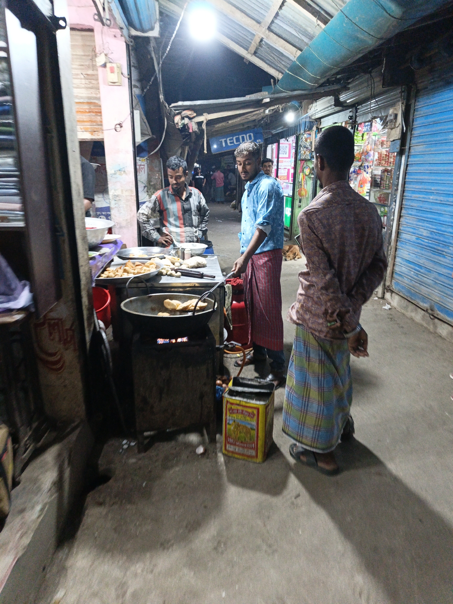 Street vendors and small businesses operate across Bangladesh markets