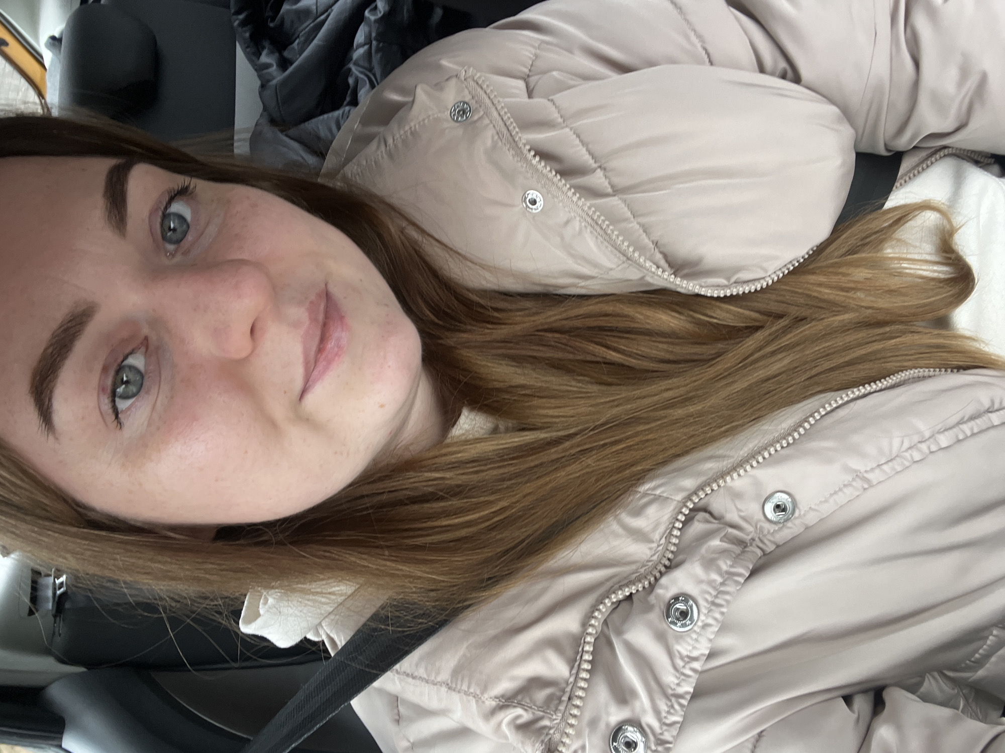Woman takes car selfie in Rogachovo, Russia