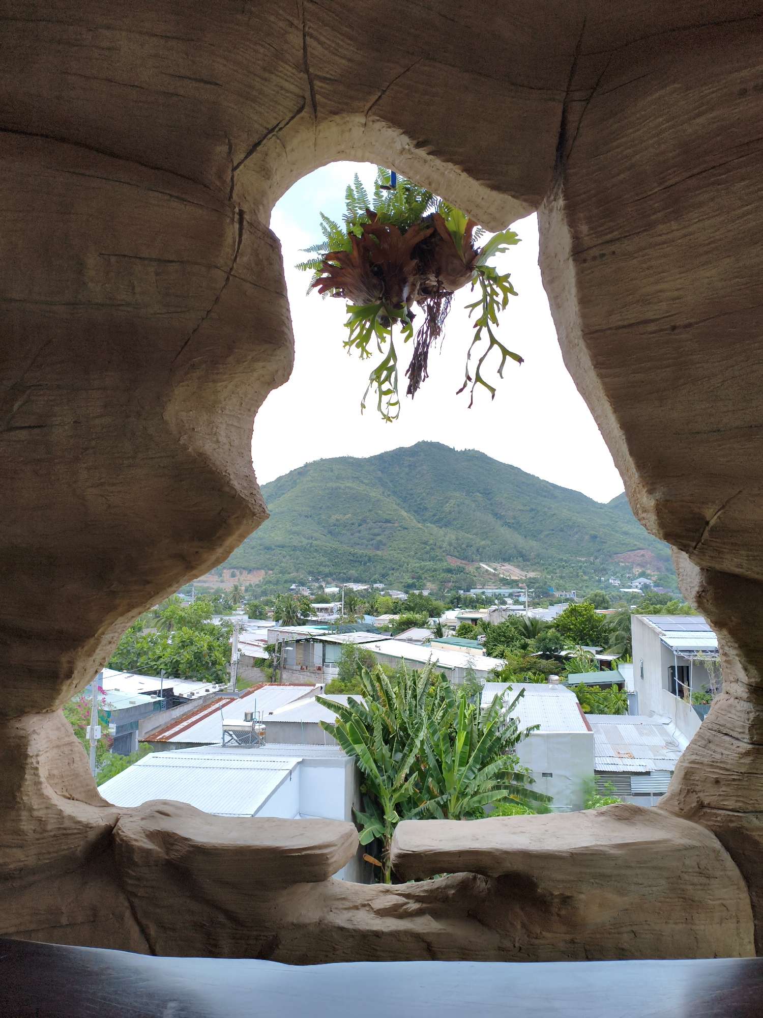 Cave-themed bar in Nha Trang blends rustic rock and mountain views